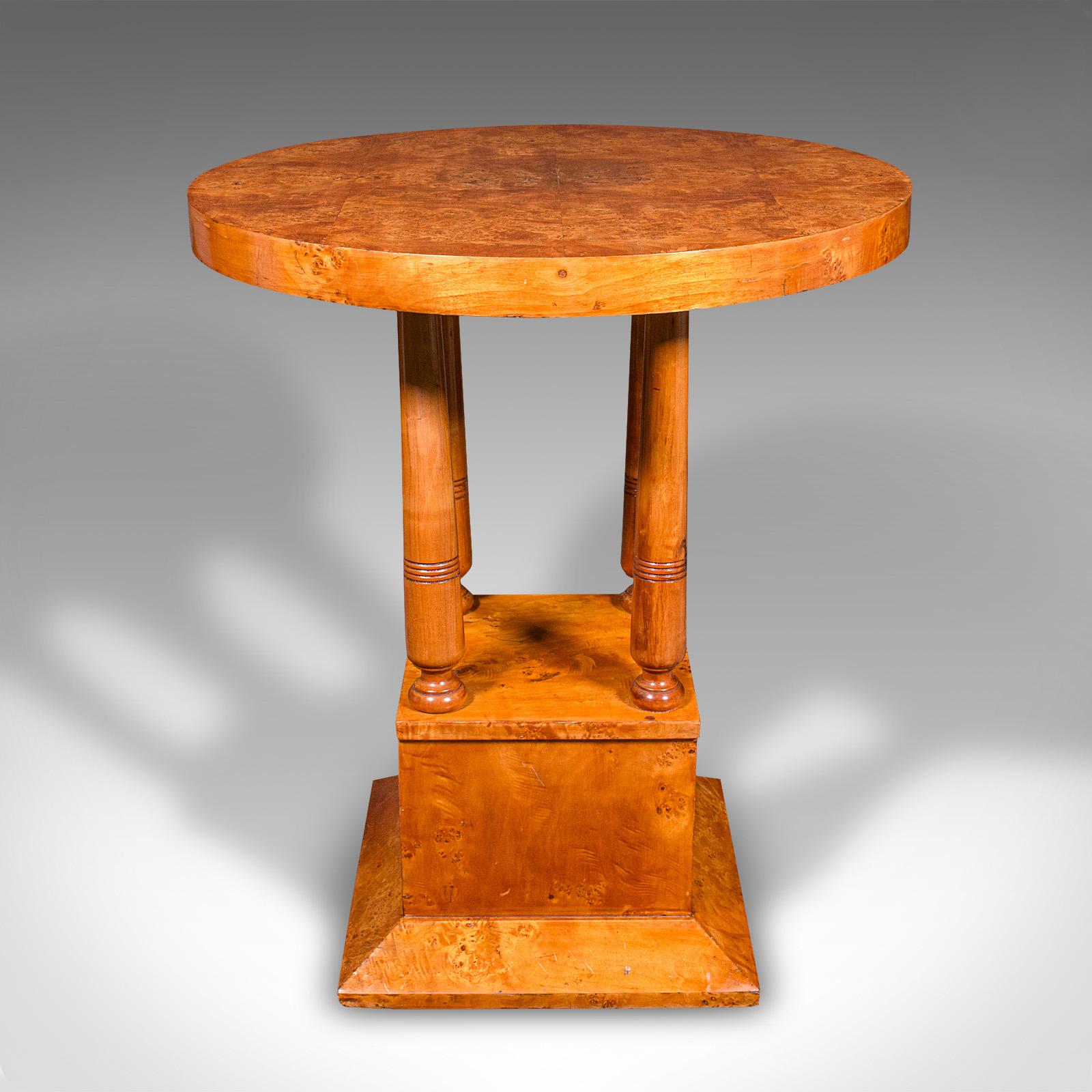 This is a vintage podium hall table. A French, bird's eye maple lamp or side table, dating to the Art Deco period, circa 1930.

Strikingly decorative circular table sure to grace any hall or room
Displays a desirable aged patina and in good order