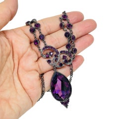Vintage P.o.F.J. silver tone with purple glass rhinestones designer necklace