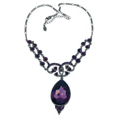 Vintage P.o.F.J. silver tone with purple glass rhinestones designer necklace