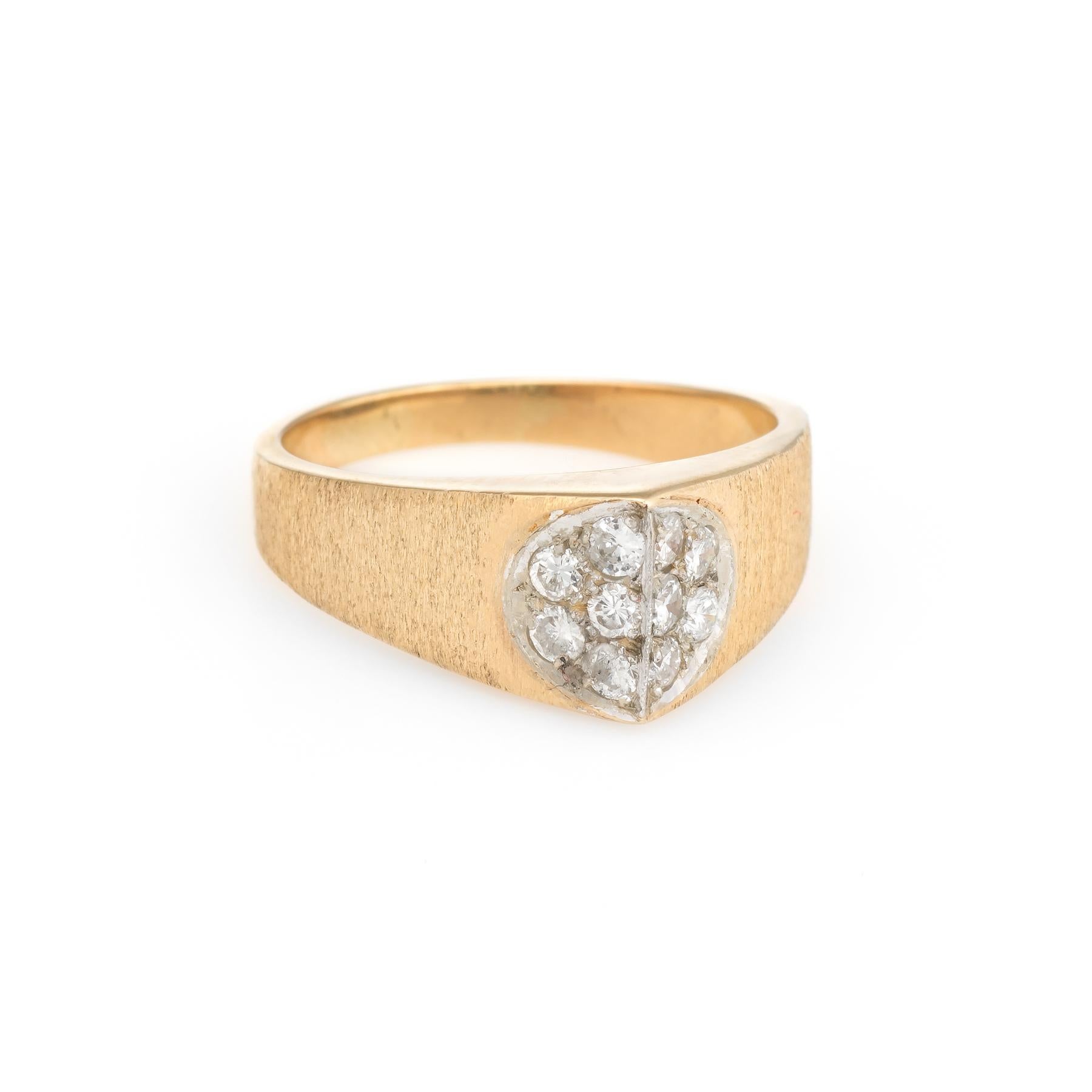 Elegant & finely detailed vintage band (circa 1960s to 1970s), crafted in 14 karat yellow gold. 

10 round brilliant cut diamonds are estimated at 0.03 carats each. The total diamond weight is estimated at 0.30 carats (estimated at H-I color and