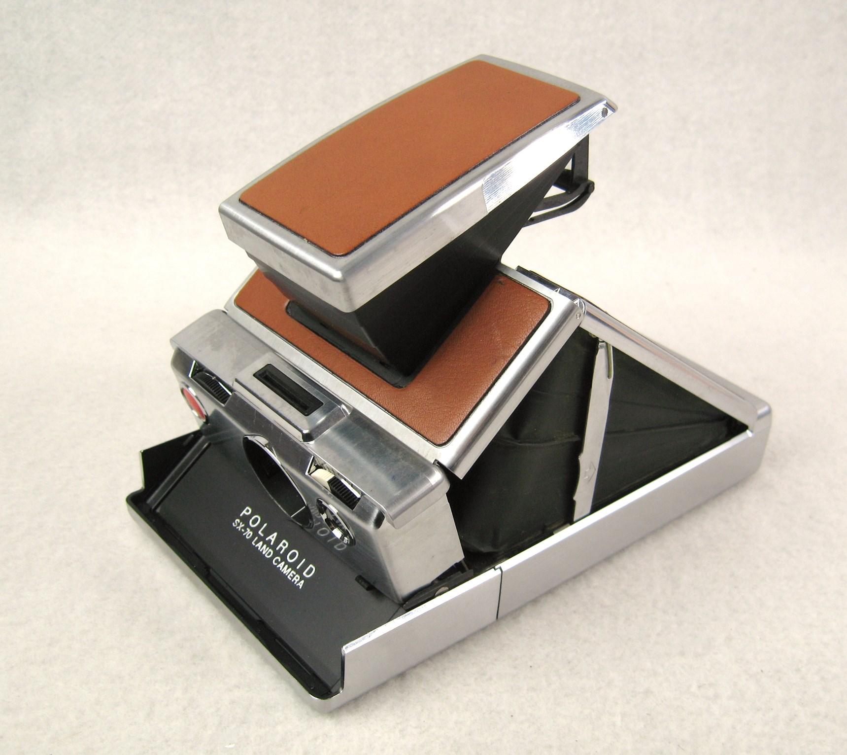 American Vintage Polaroid SX-70 Tan Land Camera by Henry Dreyfuss For Sale