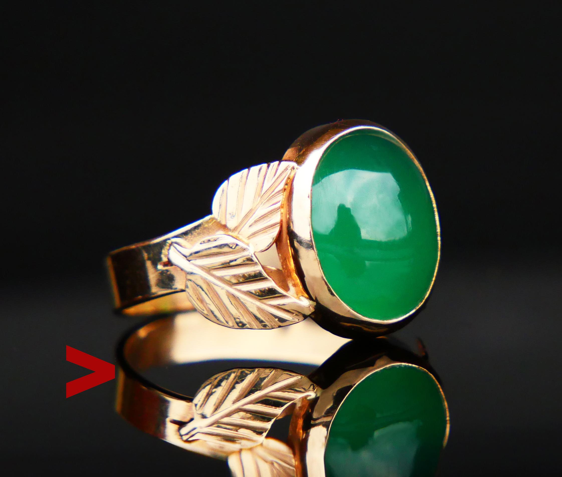 Vintage Gold and Green Chalcedony Ring with engraved leaves on the shoulders.

Hallmarked with set of Polish hallmarks confirming 14K Gold , made in the city of Warsaw, maker's hallmarks.

Bezel set natural Green Chalcedony 11 mm x 9 mm x 4.5mm deep