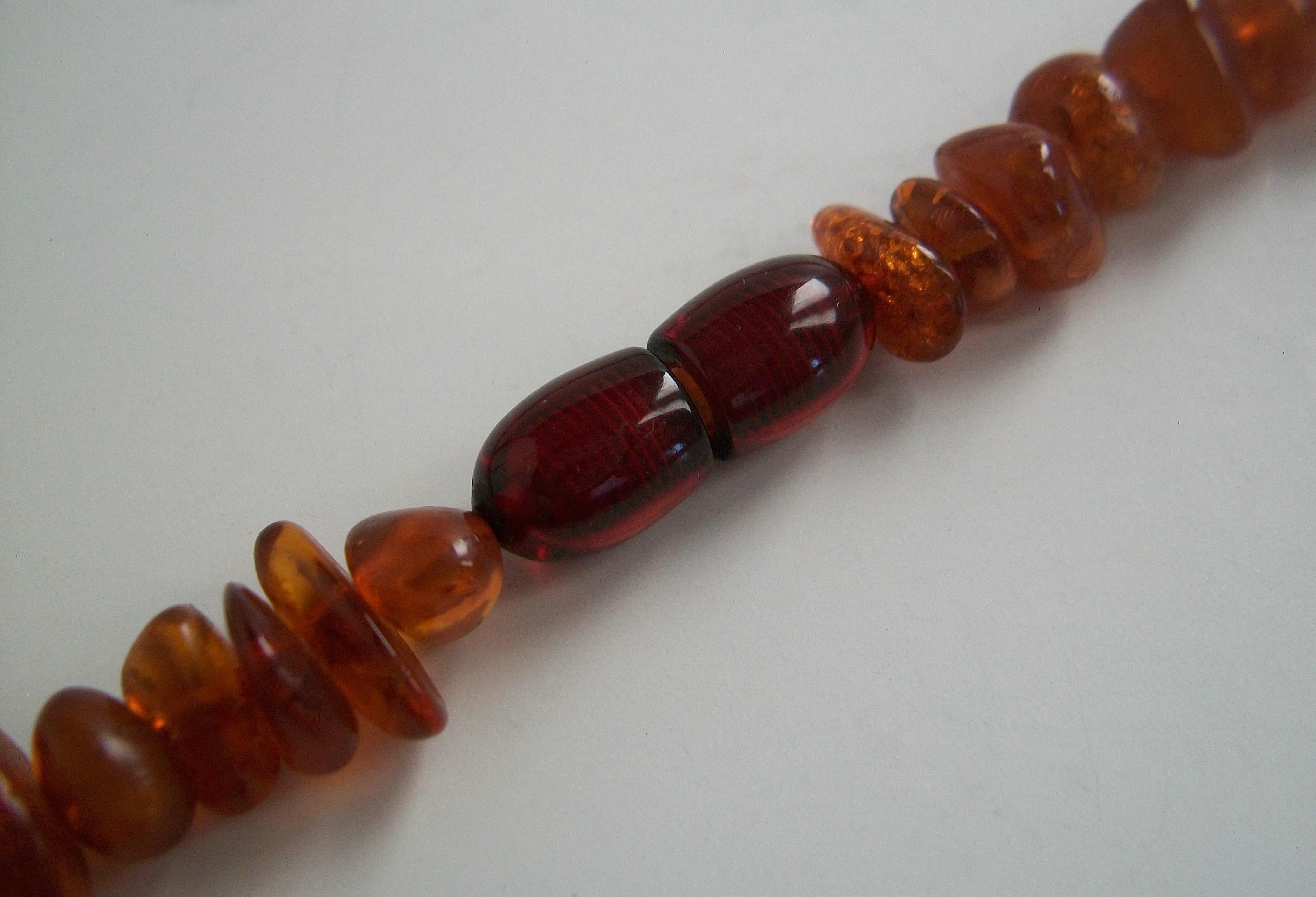 Mixed Cut Vintage Polished Baltic Amber Necklace, 44 Grams, Europe, C.1930's For Sale