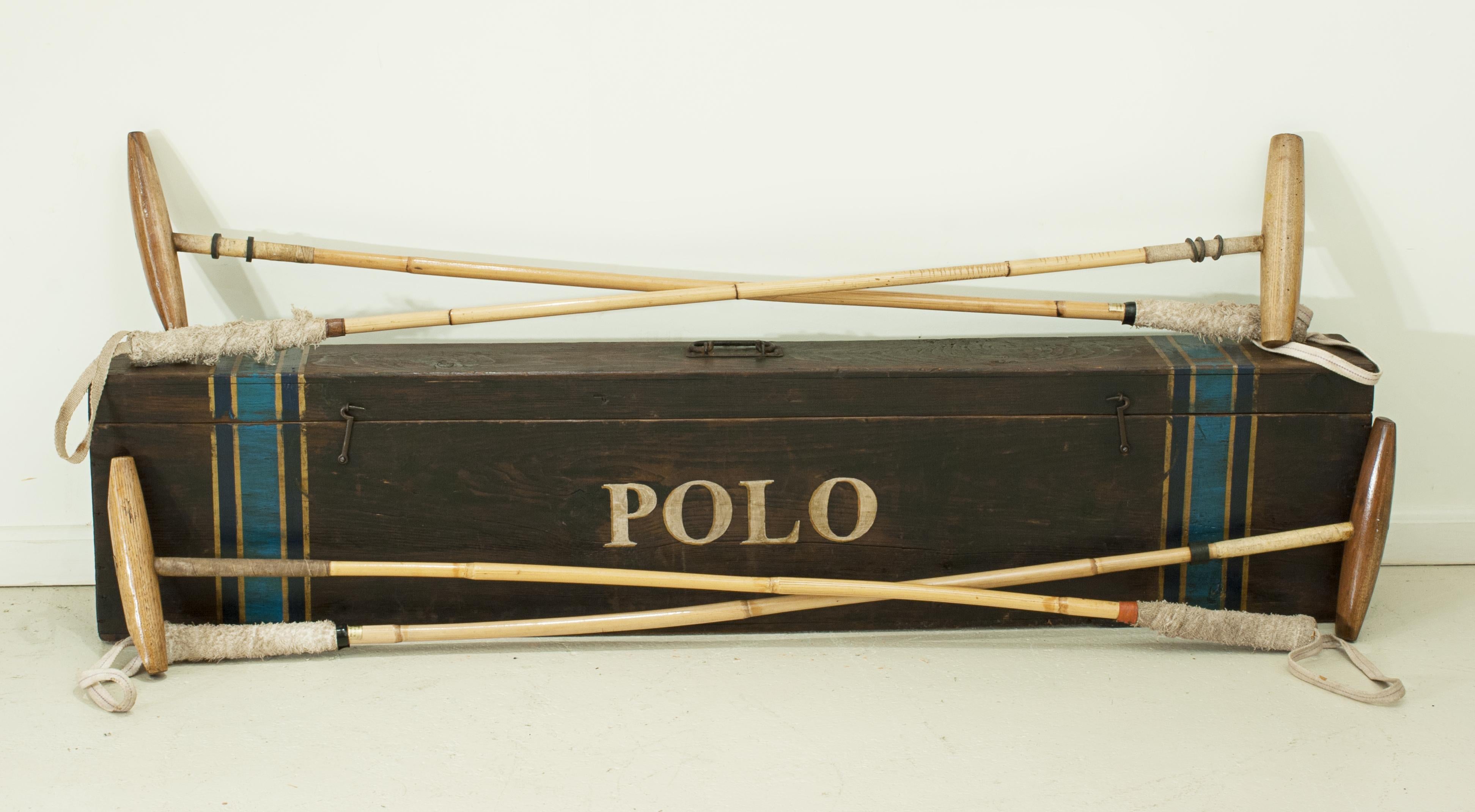Vintage Polo mallet box.
A good sturdy polo mallet carry box. The box is made of pine with one metal carry handle and two catch hooks. The box has been newly refurbished with the colour bands and the 'POLO' inscription to the front. The box comes