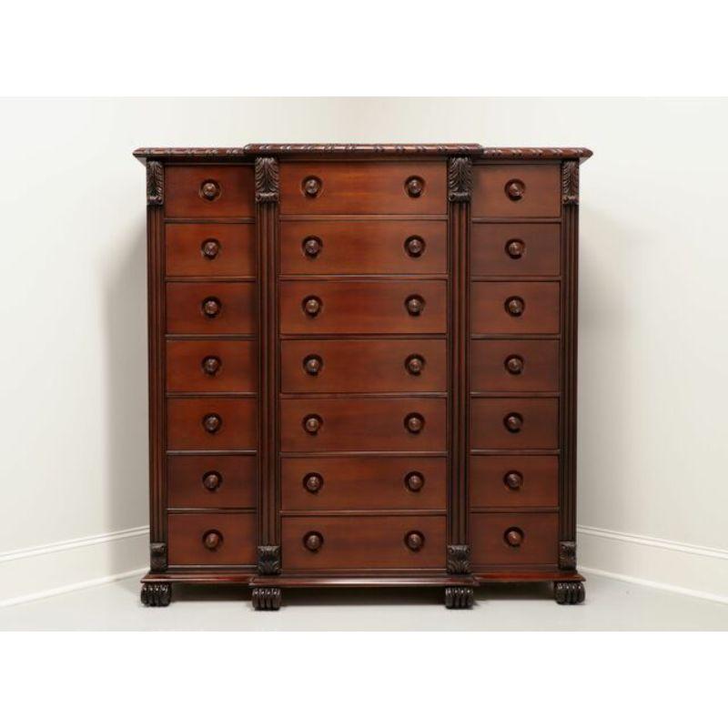 A Transitional style, monumentally sized, 21-drawer chest by Polo Ralph Lauren for Henredon. Solid mahogany and mahogany veneers with wood knobs. Carved details, drawer flanking columns, dovetail drawer construction and carved feet. Made in the USA,