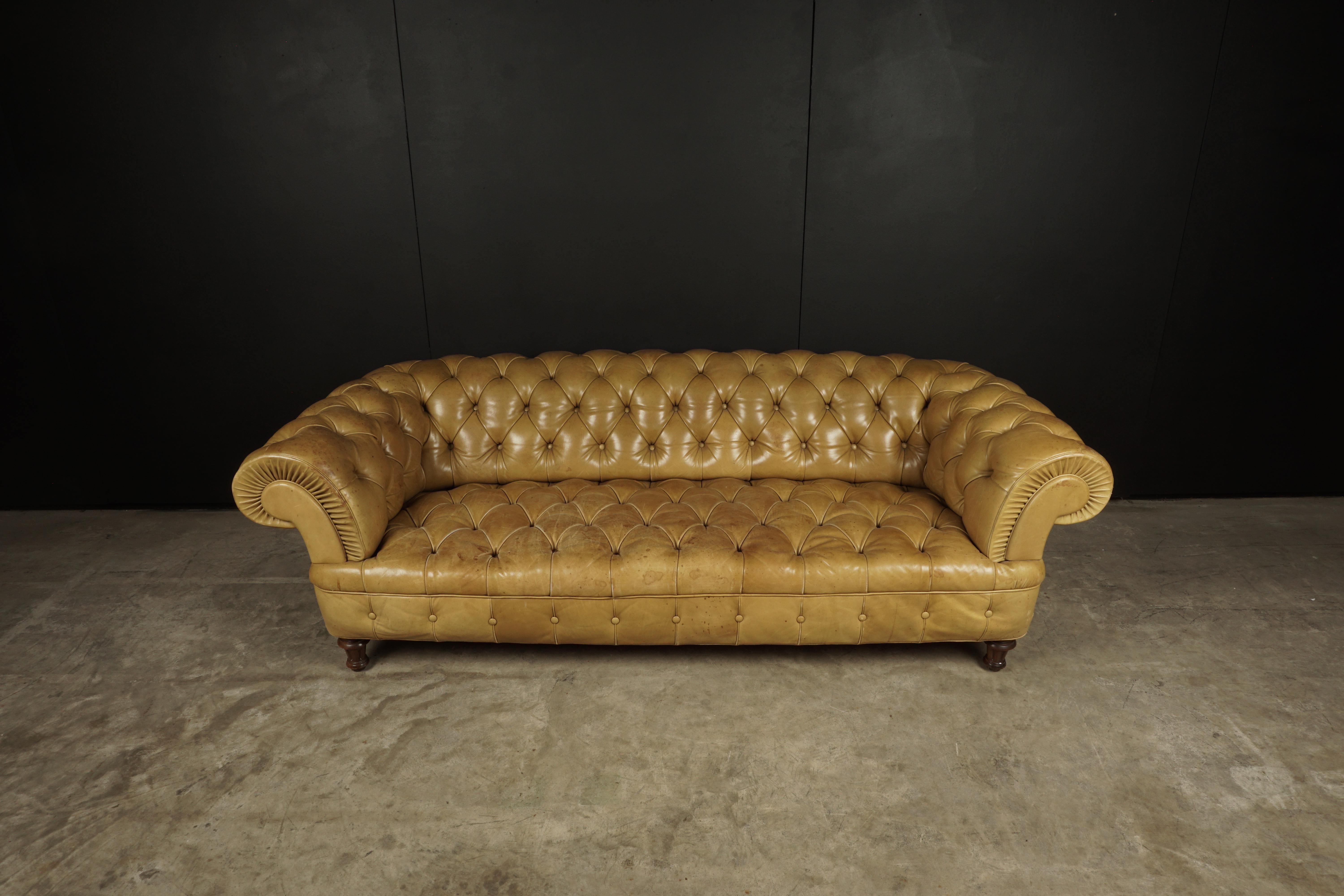 Vintage Poltrona Frau Chesterfield sofa, Italy, 1980s. Original cognac leather upholstery with fantastic wear and patina. Manufacturers mark on side.