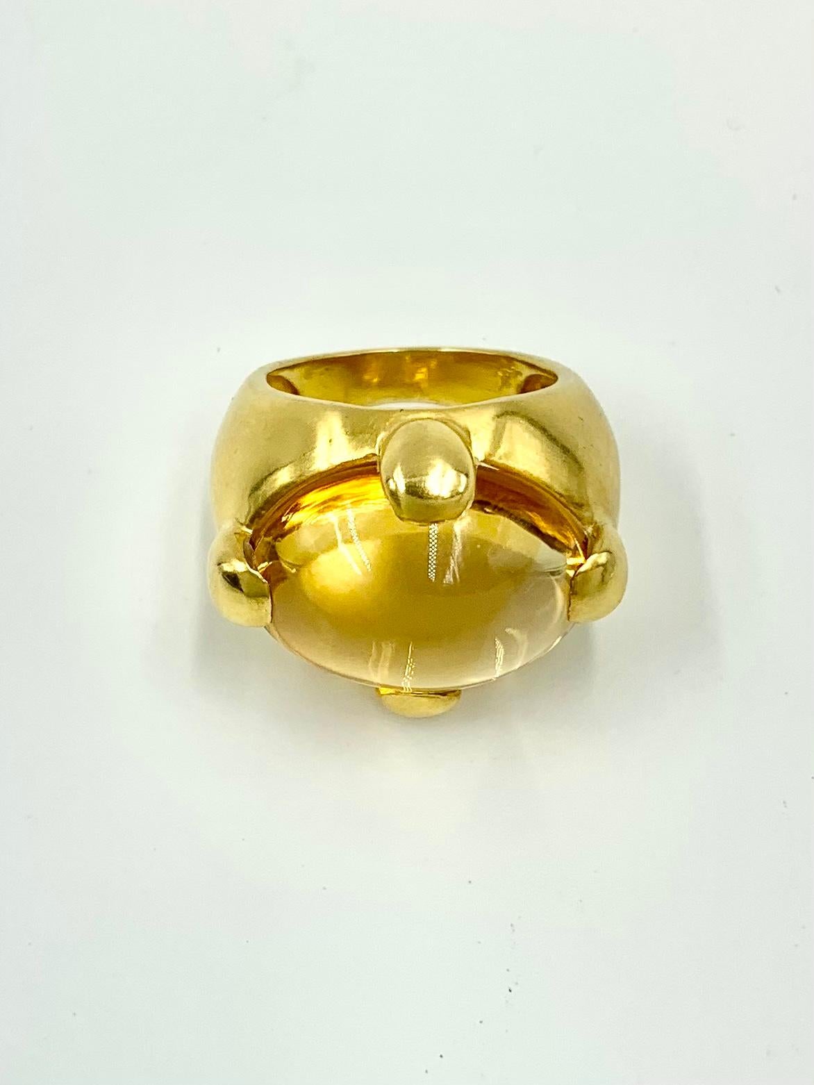 Estate sourced elegant Pomellato Griffe 9.5 Carat Golden Citrine 18K yellow gold ring.
Size 6US
Very good condition
Marks: 18K, partial Pomellato signature on the interior
Citrine is golden yellow, clean, lively, 17mm by 13mm by 6mm