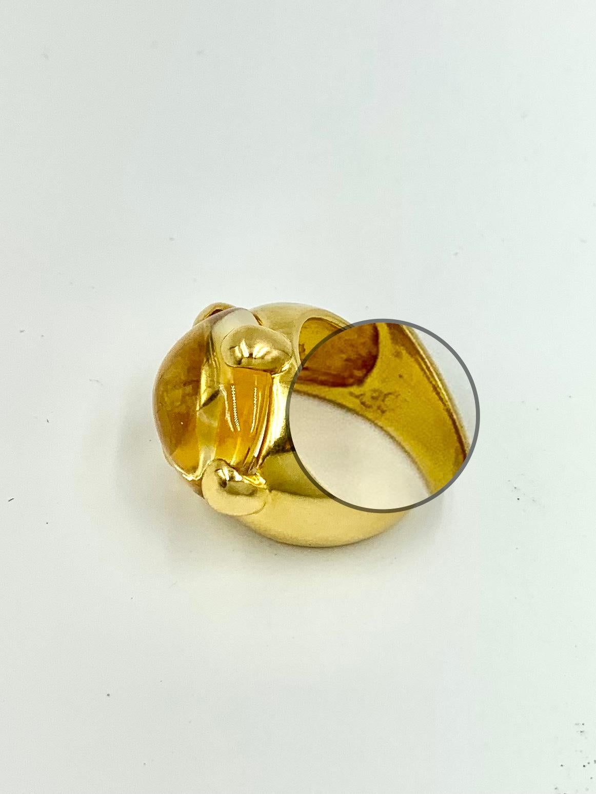 Vintage Pomellato 9.5 Carat Cabochon Citrine 18K Yellow Gold Griffe Ring In Good Condition For Sale In New York, NY