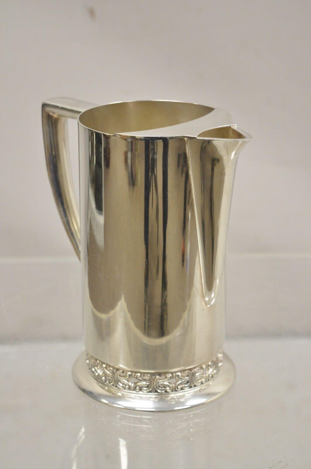 Vintage Poole Silver Co Celtic Fretwork Silver Plated Art Deco Water Pitcher. Circa  Mid 20th Century. Measurements:  8