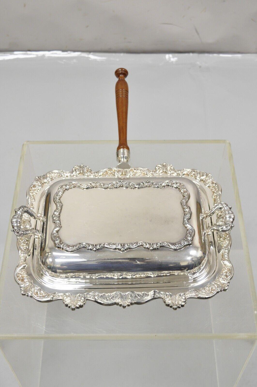 Vintage Poole Silver Co Victorian Style Silver Plated Lidded Serving Platter with Wooden Handle. Item features a removable wooden handle, ornate decoration, original hallmark. Circa Mid 20th Century. Measurements:  4