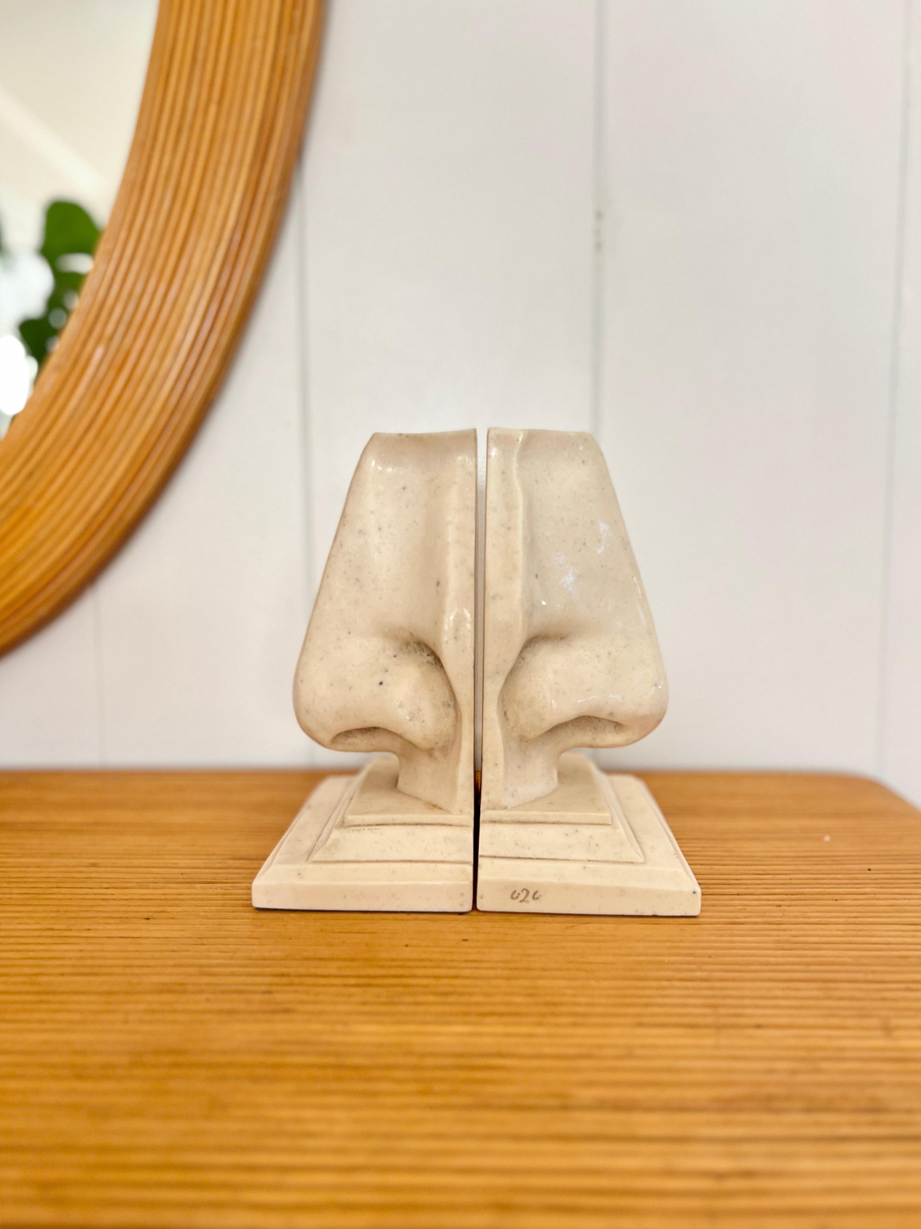 Vintage unusual nose bookends by C2C designs. Replicas of the Michelangelo’s nose and have the look of alabaster stone/composite marble. In good condition! 

Dimensions:
9” H x 6.5” W x 4” D.