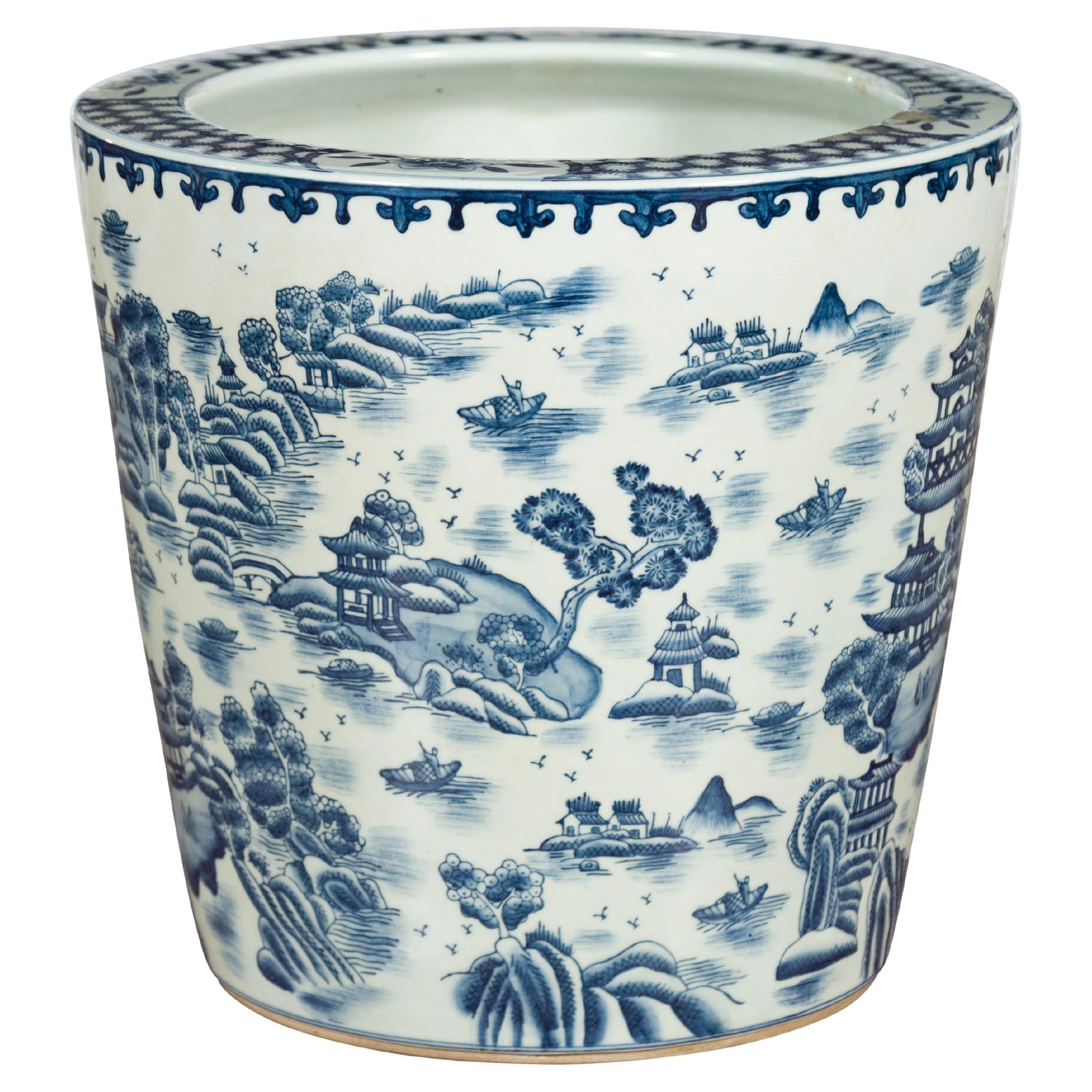 Cache-pot en porcelaine vintage avec paysage montagneux bleu et blanc