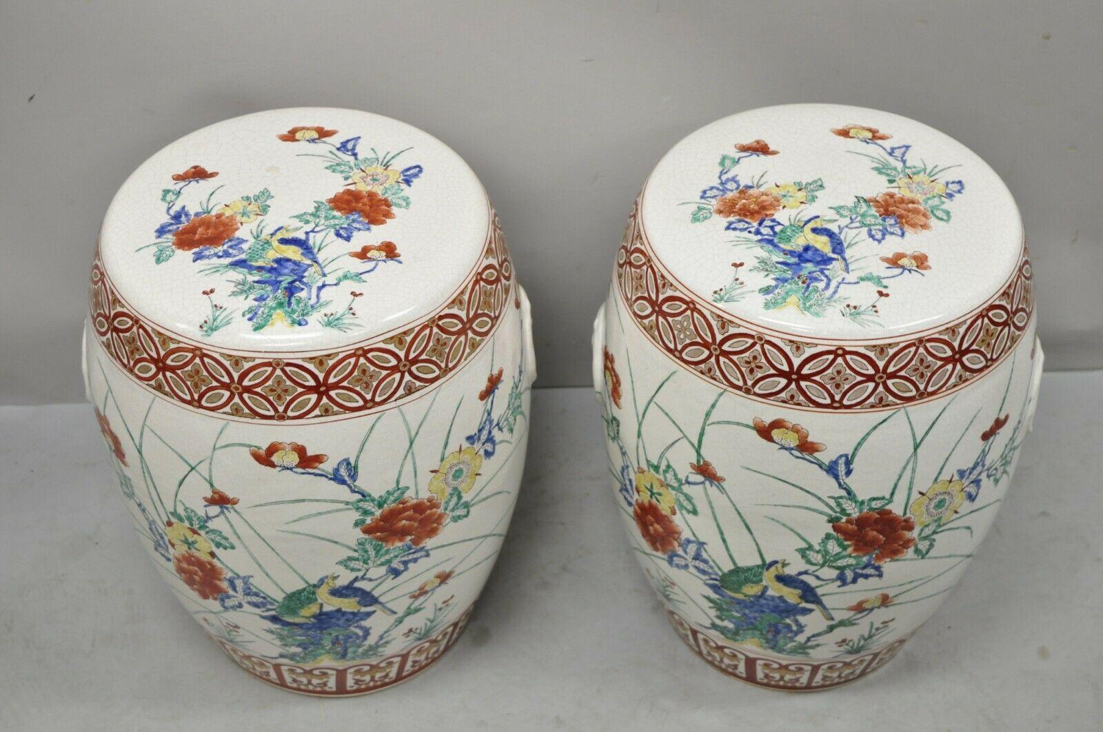 Vintage Porcelain ceramic Chinoiseries oriental red blue garden seat - a Pair. Item features beautiful bird and flower design, very nice pair, great style and form, approx. 30lbs each. Circa Late 20th century. Measurements: 19