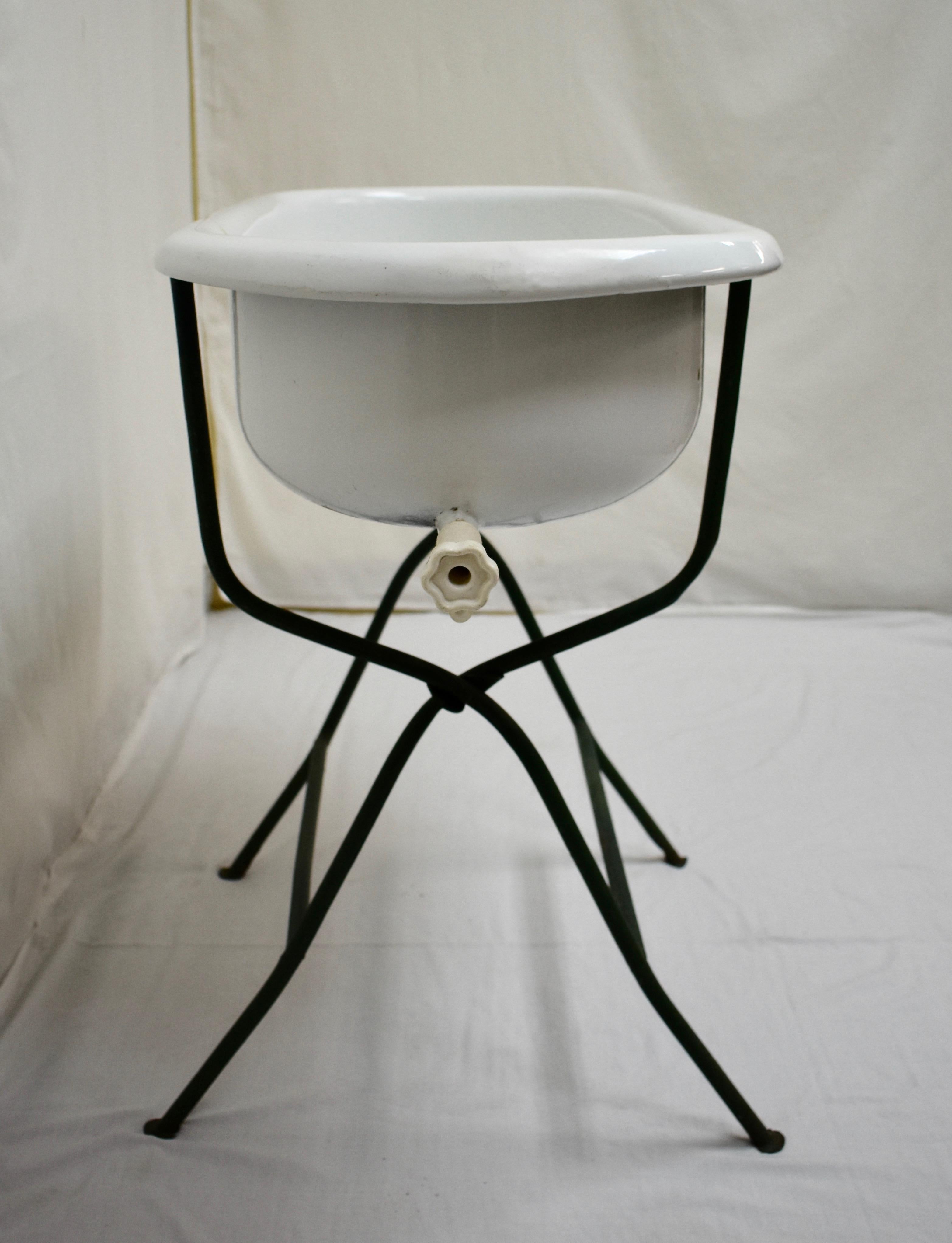 Enameled Vintage Porcelain Enamel Baby Bath on Folding Wrought Iron Stand