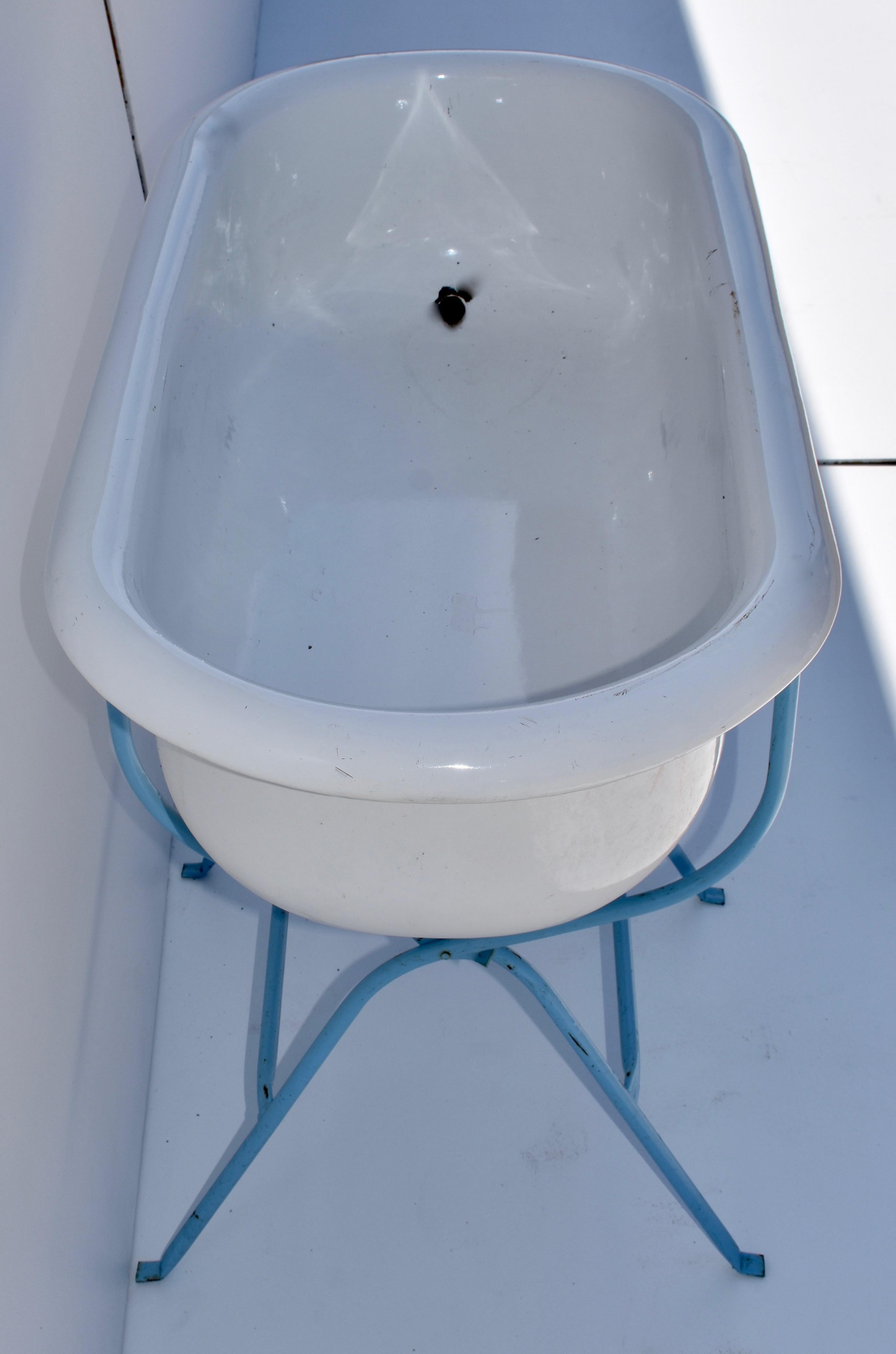 antique baby bathtub with stand