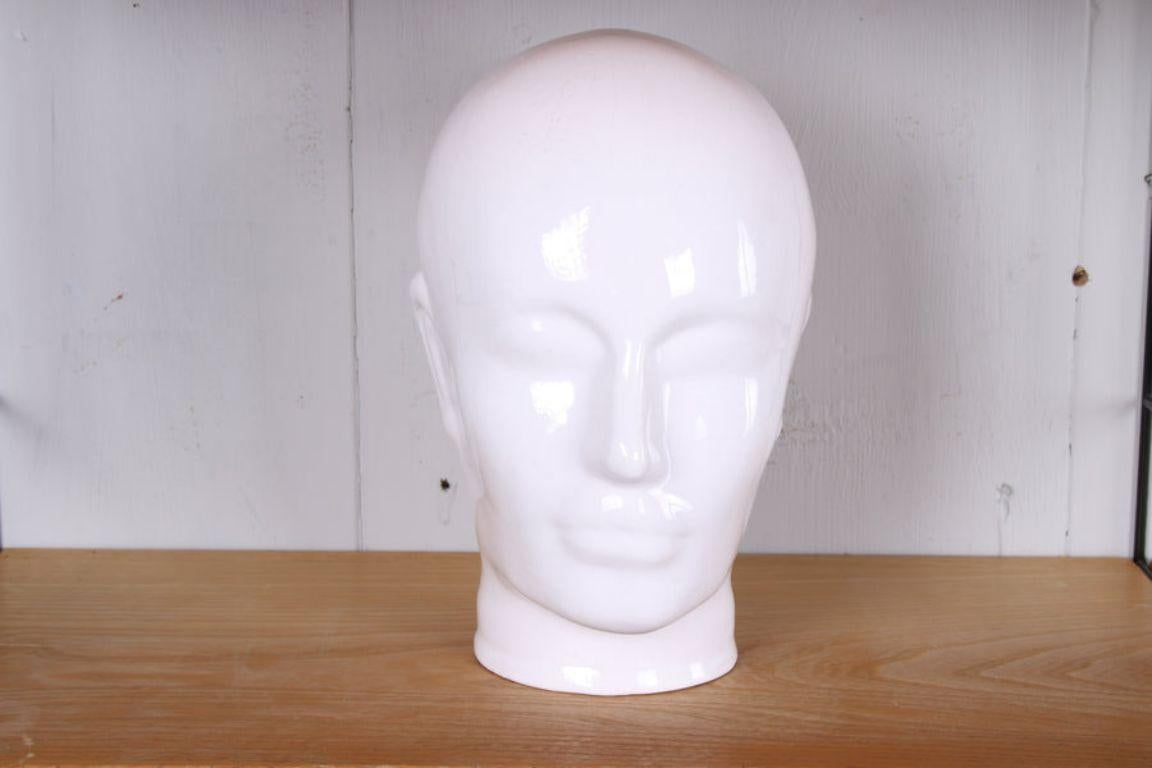 Vintage Porcelain Mannequin Head, 1960s

Vintage porcelain 1960s shop window head, mannequin head or shop window head for a hat shop. 

Now these heads are used as decoration or for headphones

Additional information: 

Dimensions: 15 W x 20 D x 25