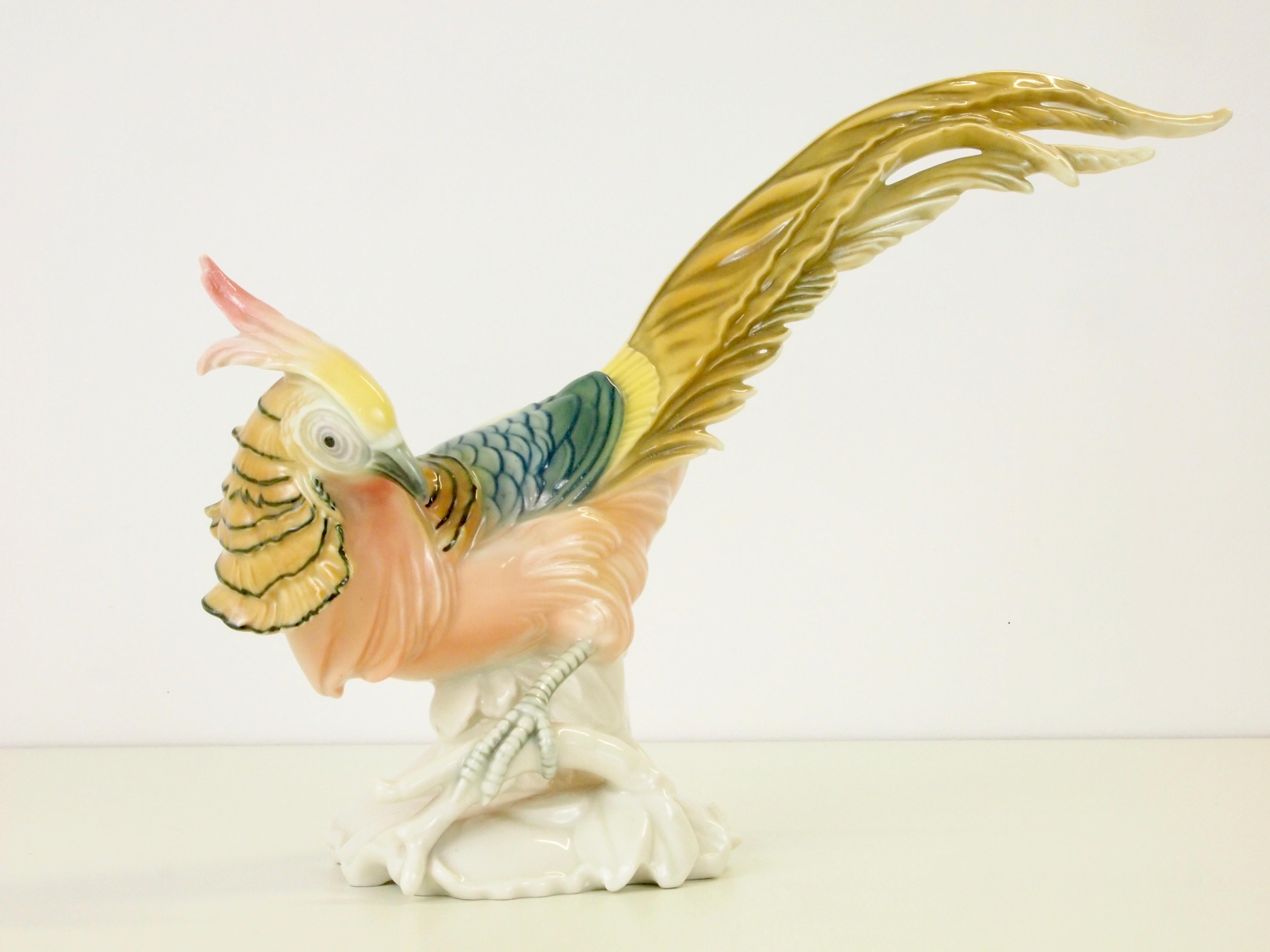 Midcentury German porcelain figurine depicting a pheasant in soft pastel colors by Karl Ens Volkstedt (Dresden)

A lovely piece of high quality porcelain. Hand painted full with fine details and beautiful colors.

Condition: In very good vintage