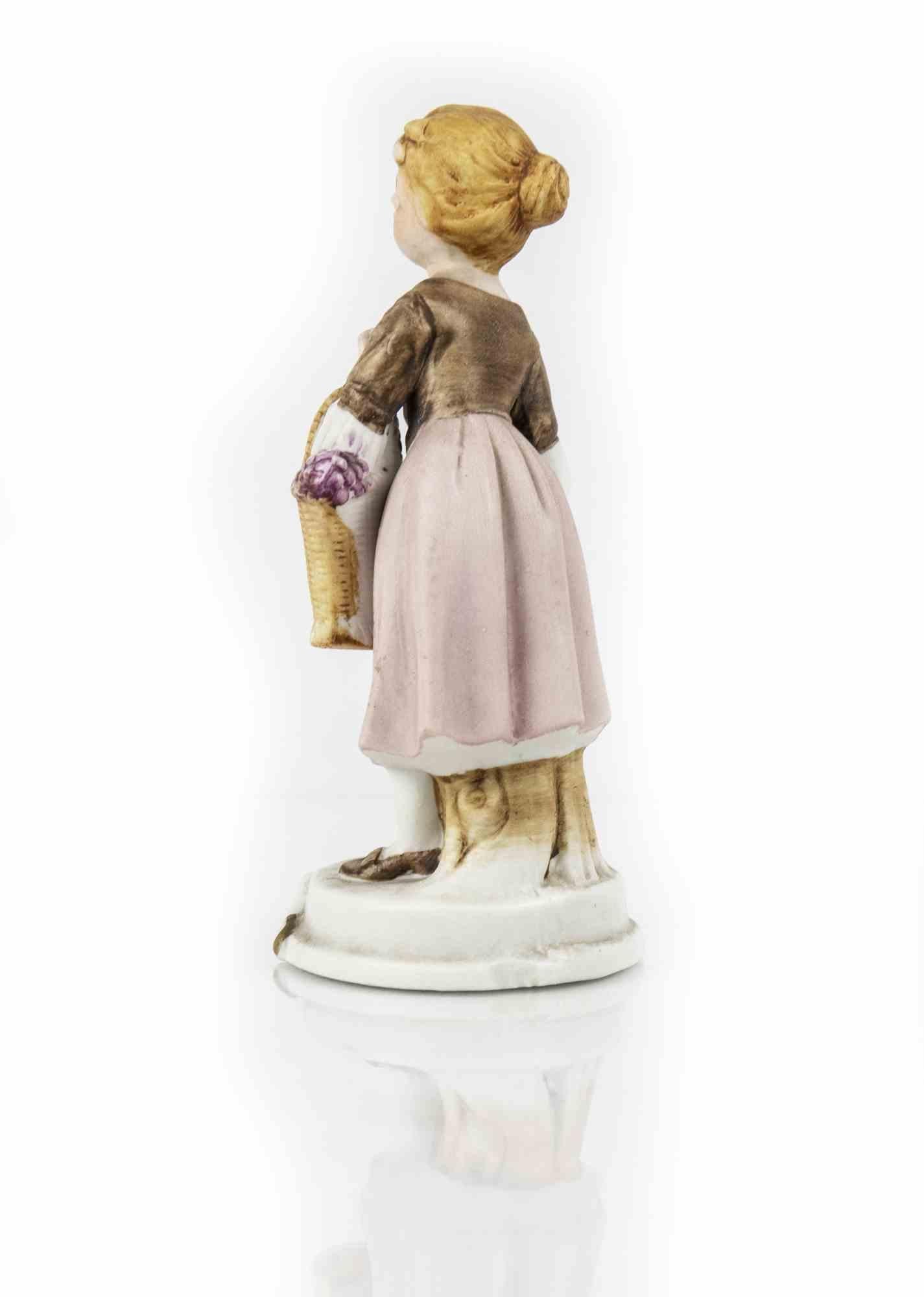 European Vintage Porcelain Sculpture of Girl with Basket, Mid-20th Century For Sale