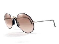 Lunettes de soleil vintage Porsche 5658 rondes noires et dorées à verres dégradés 80's Autriche