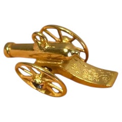 Vintage 19.2Kt Yellow Gold Cannon Pendant with Sapphire Accent