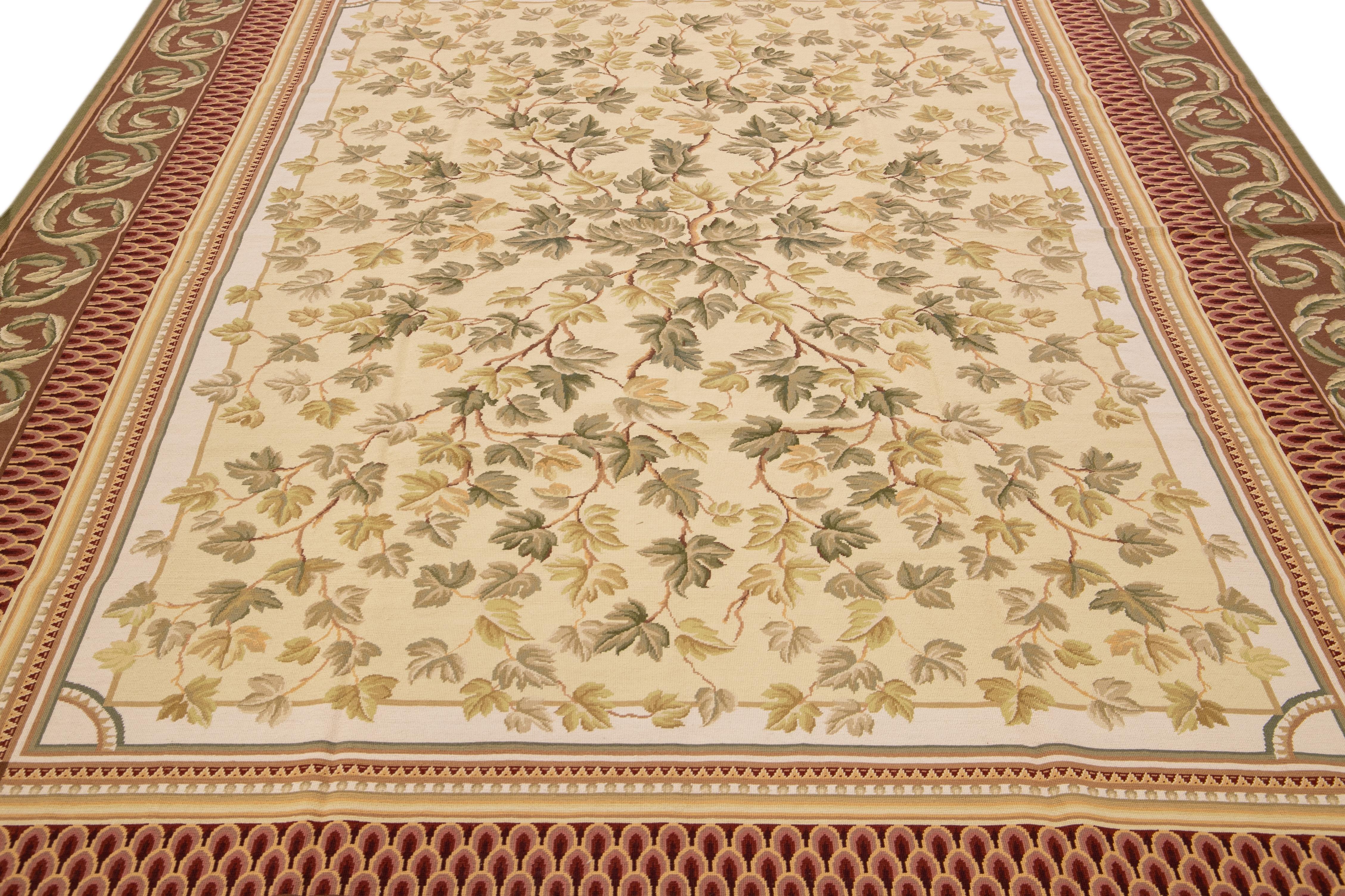 Beautiful Vintage Portuguese Arraiolos needlepoint wool rug with a beige field. This piece has fine details in a multicolor gorgeous floral pattern design. 

This rug measures 9' x 12'.

Our Rugs are professional cleaning before shipping.

 