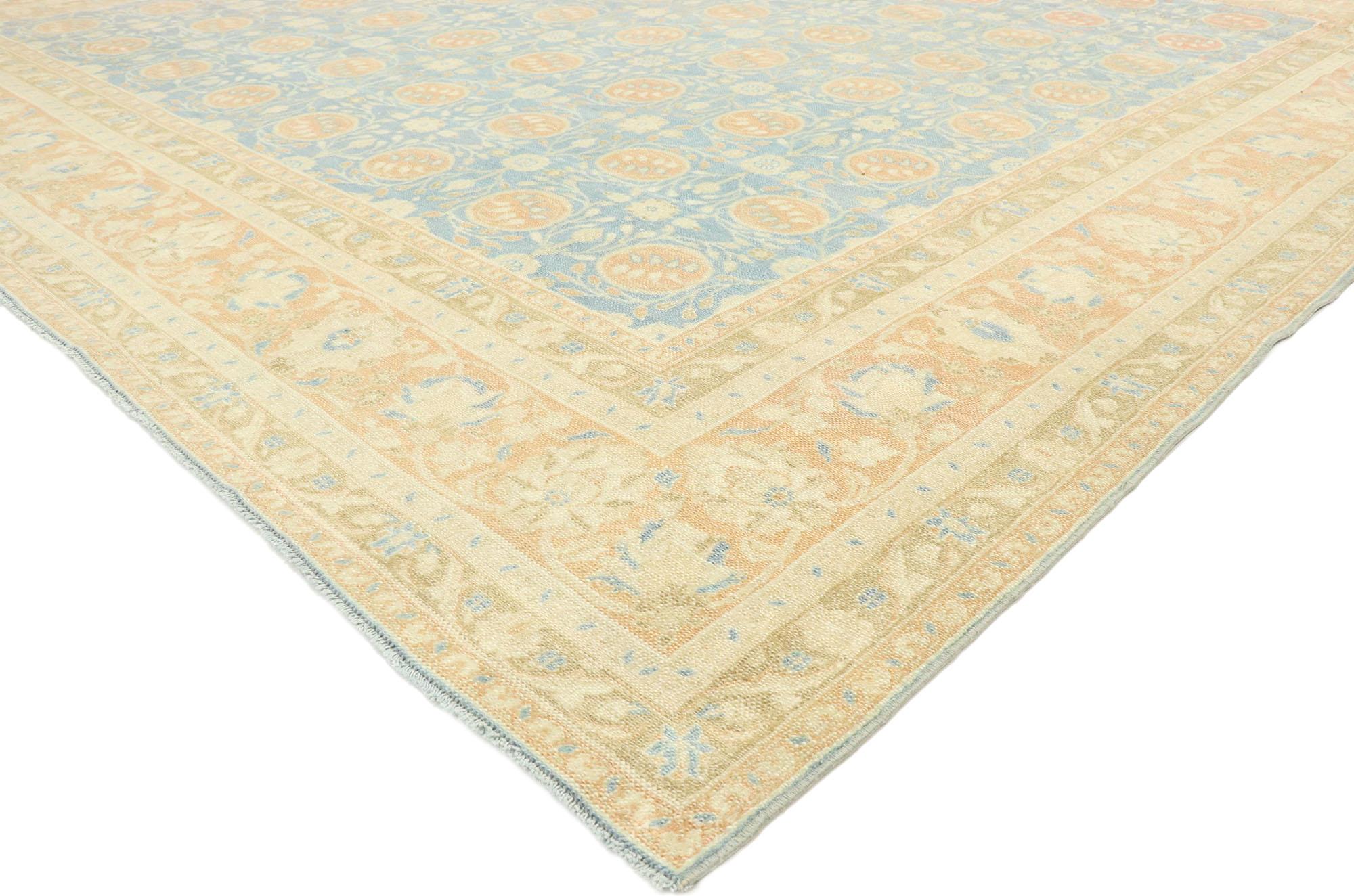 53034 distressed vintage Portuguese Khotan style rug with Italian Mediterranean style. Melding sumptuous elegance and weathered beauty, this hand knotted wool distressed vintage Portuguese Khotan style rug is poised to impress. The lovingly