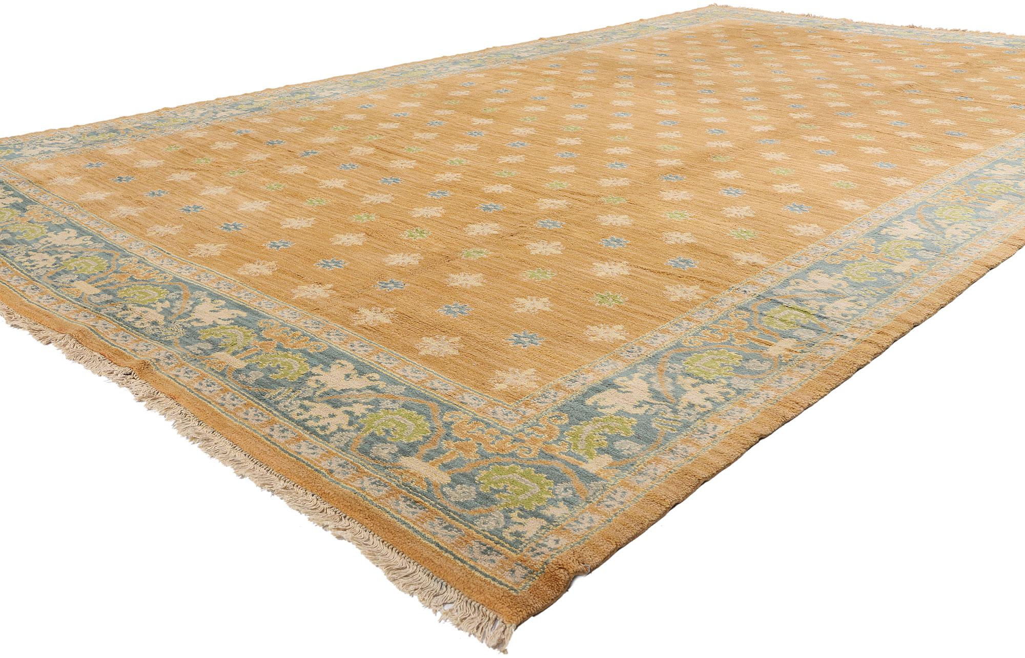 76683 Vintage Portuguese Rug, 08'10 x 14'10. This exquisite vintage Portuguese rug, meticulously hand-knotted from fine wool, stands as a testament to the rich textile heritage of Portugal. The golden-tan field of the rug is elegantly adorned with