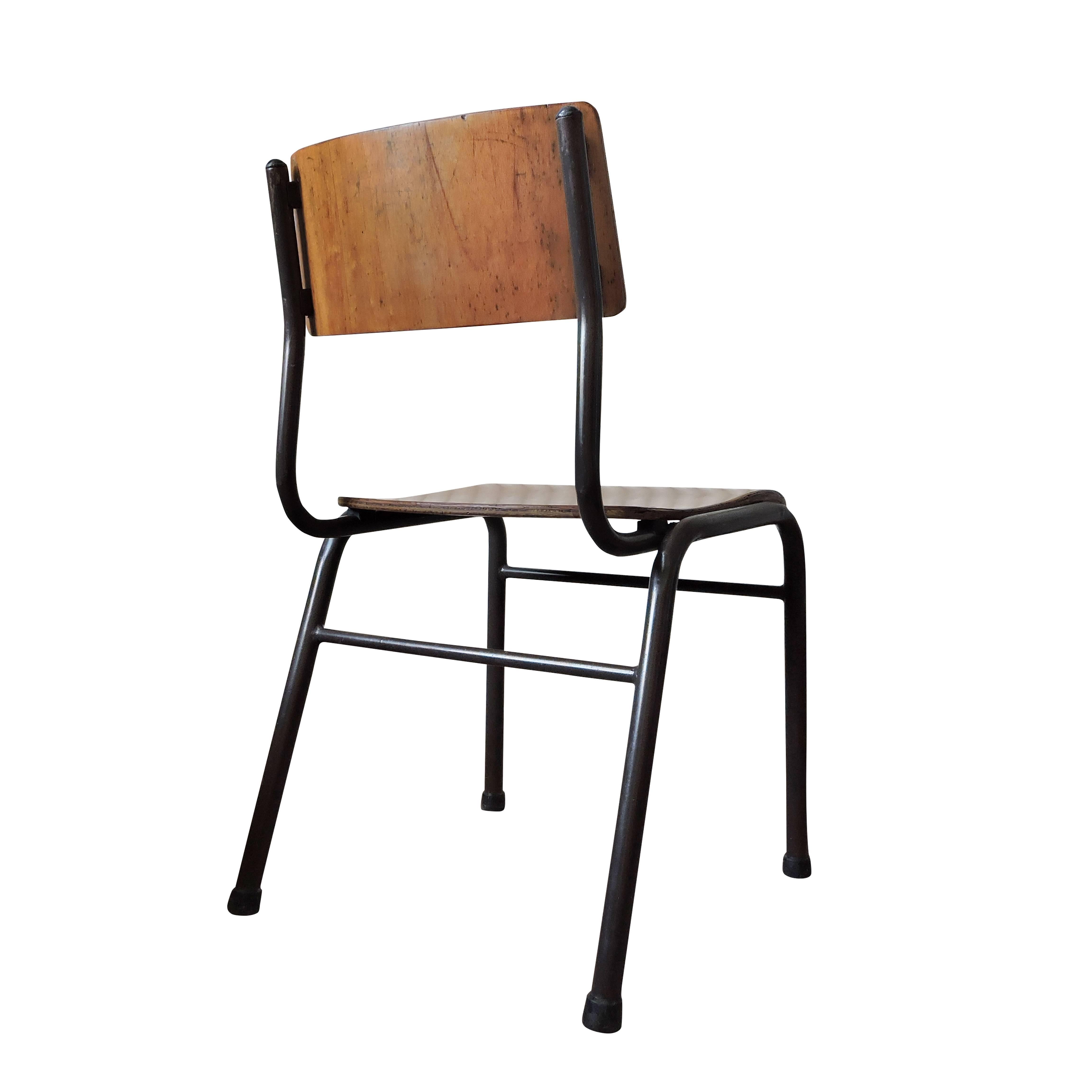 This former high school chair from Portugal has a grey painted frame and a brown wooden seat and backrest.
