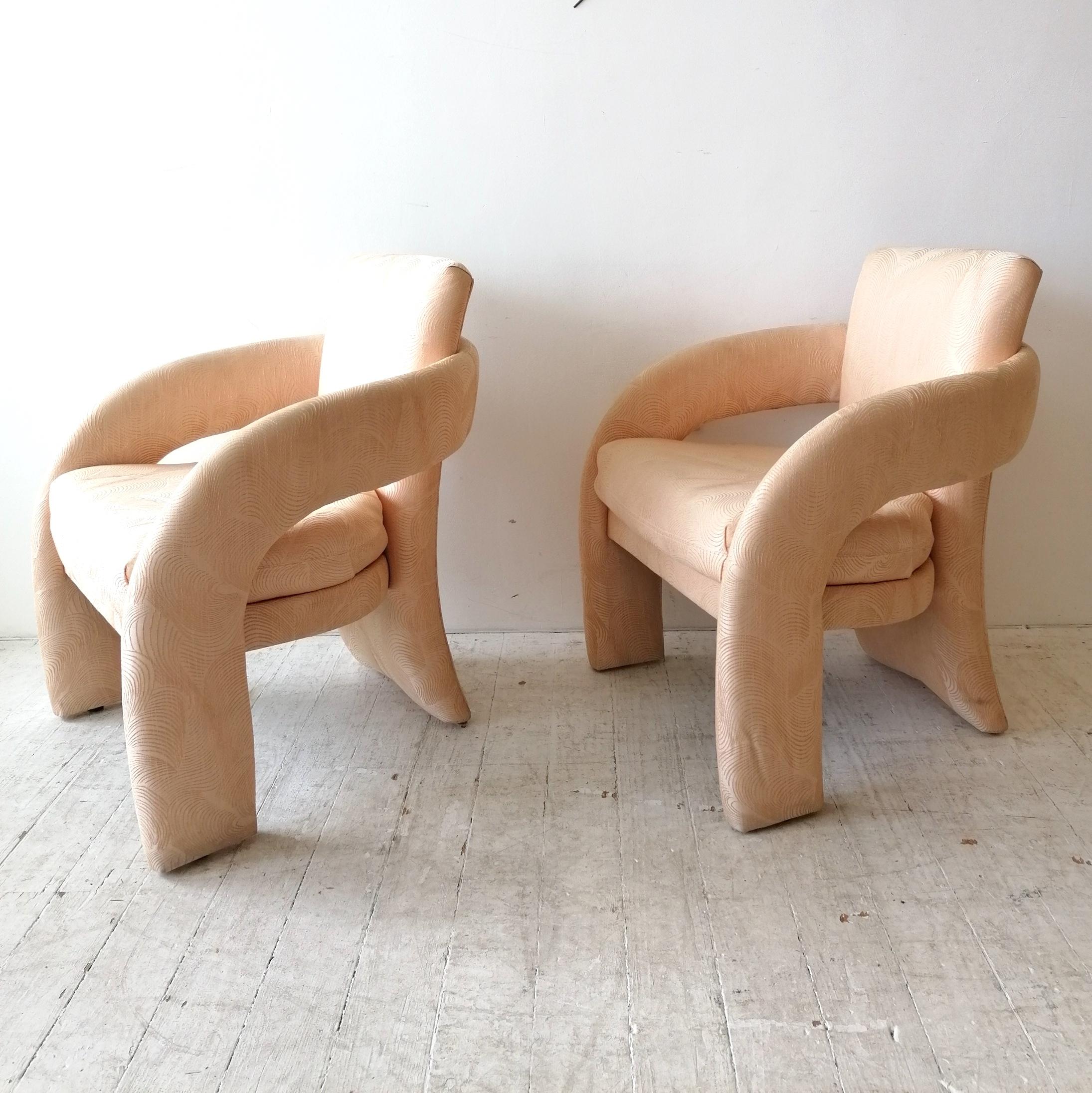 Sculptural Postmodern American pale peachy pink lounge chairs by Carson Furniture. The upholstery is in excellent condition- ignore the slight creasing, that's from being wrapped during shipping from the US.. It'll settle. 
This price is for ONE