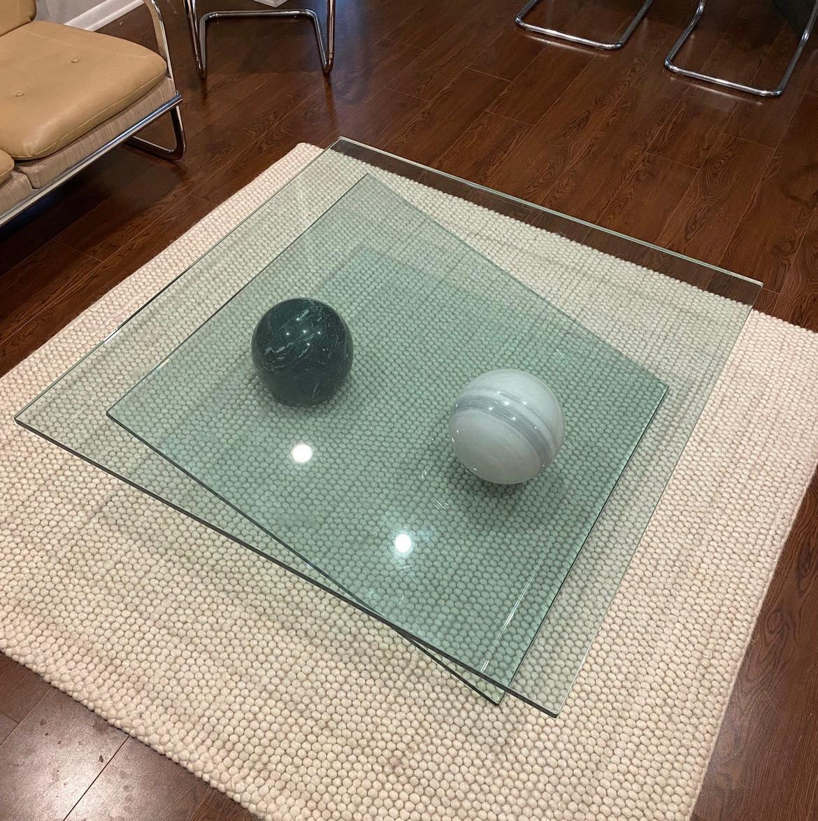 Vintage geometric glass and marble coffee table by Roche Bobois. Although I believe the table to be authentic, there is no makers mark. Table is unmarked. Comes with 2 pieces of glass that are 3/4” thick and 2 solid marble balls. Table is in