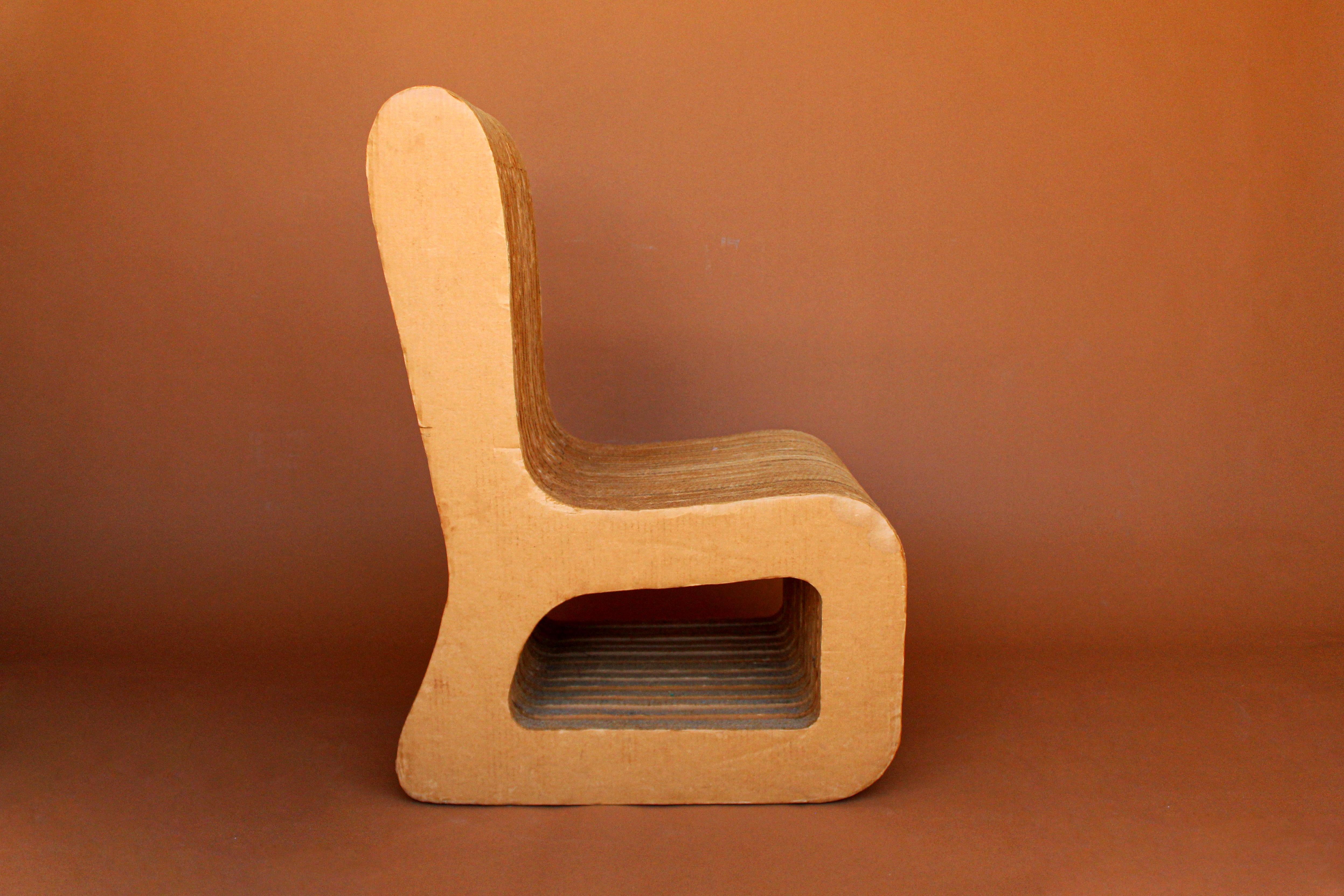 Special one of a kind post modern cardboard chair in the style of iconic Frank Gehry Wiggle chair for Vitra. We have done extensive research and have unable to find another one like it, many stories of Prototypes and different artists but we prefer