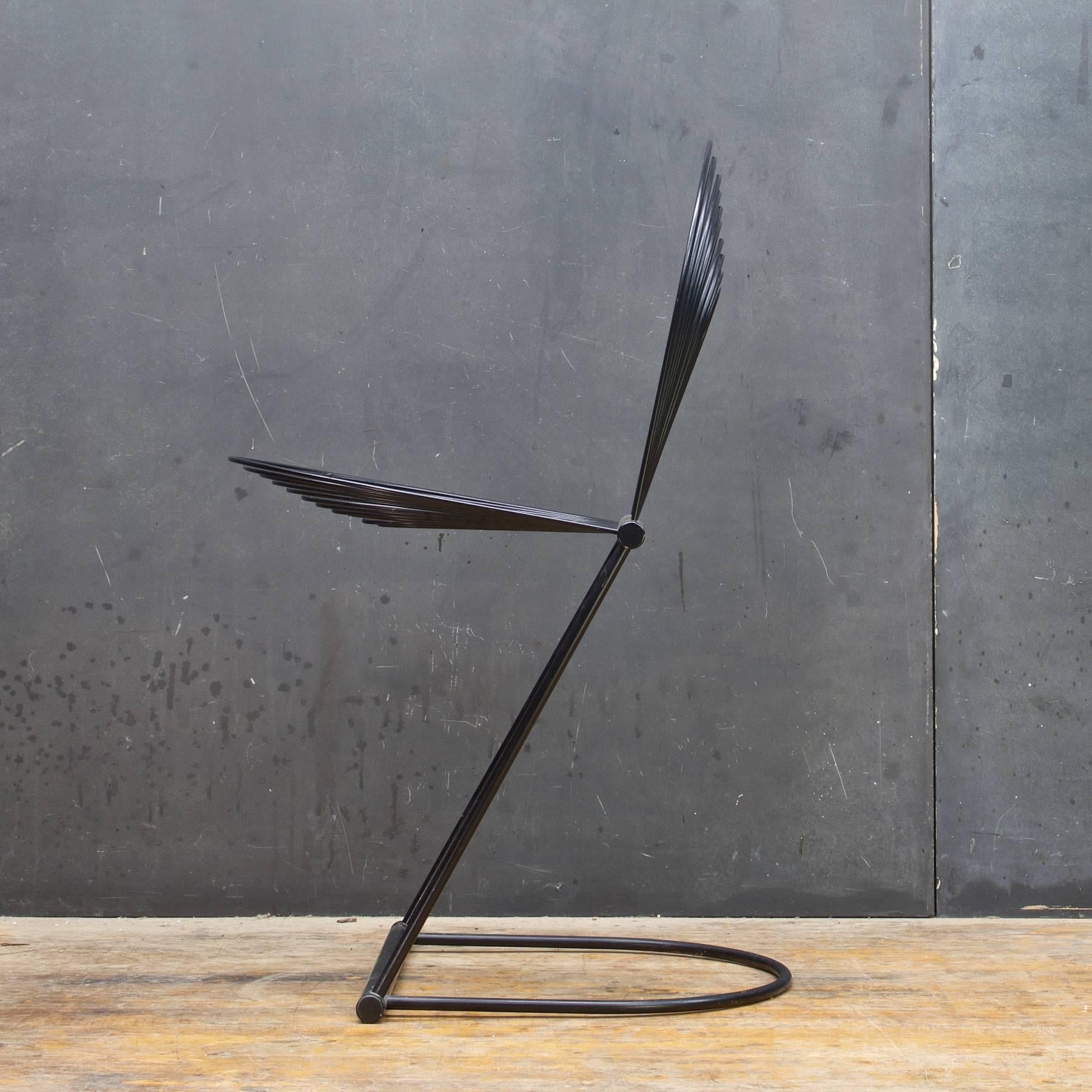 Germany, 1982.  Black enamel on aluminum, spring steel.  Jutta and Herbert Ohl, for Rosenthal Studio Linie Einrichtung.  Cantilever chair from the “Swing” Series.  
