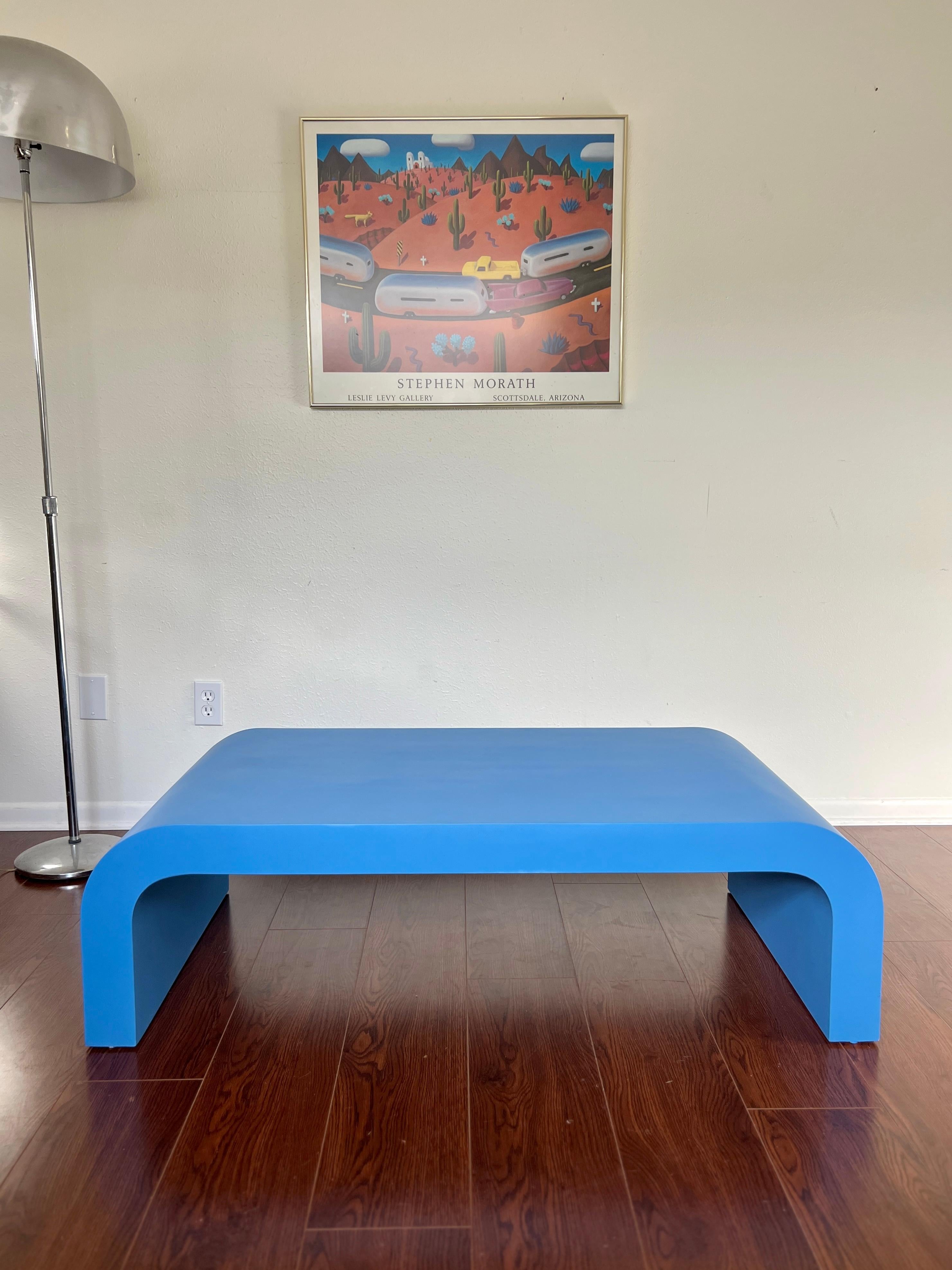 Laminated Vintage post modern waterfall coffee table in a gorgeous blue color