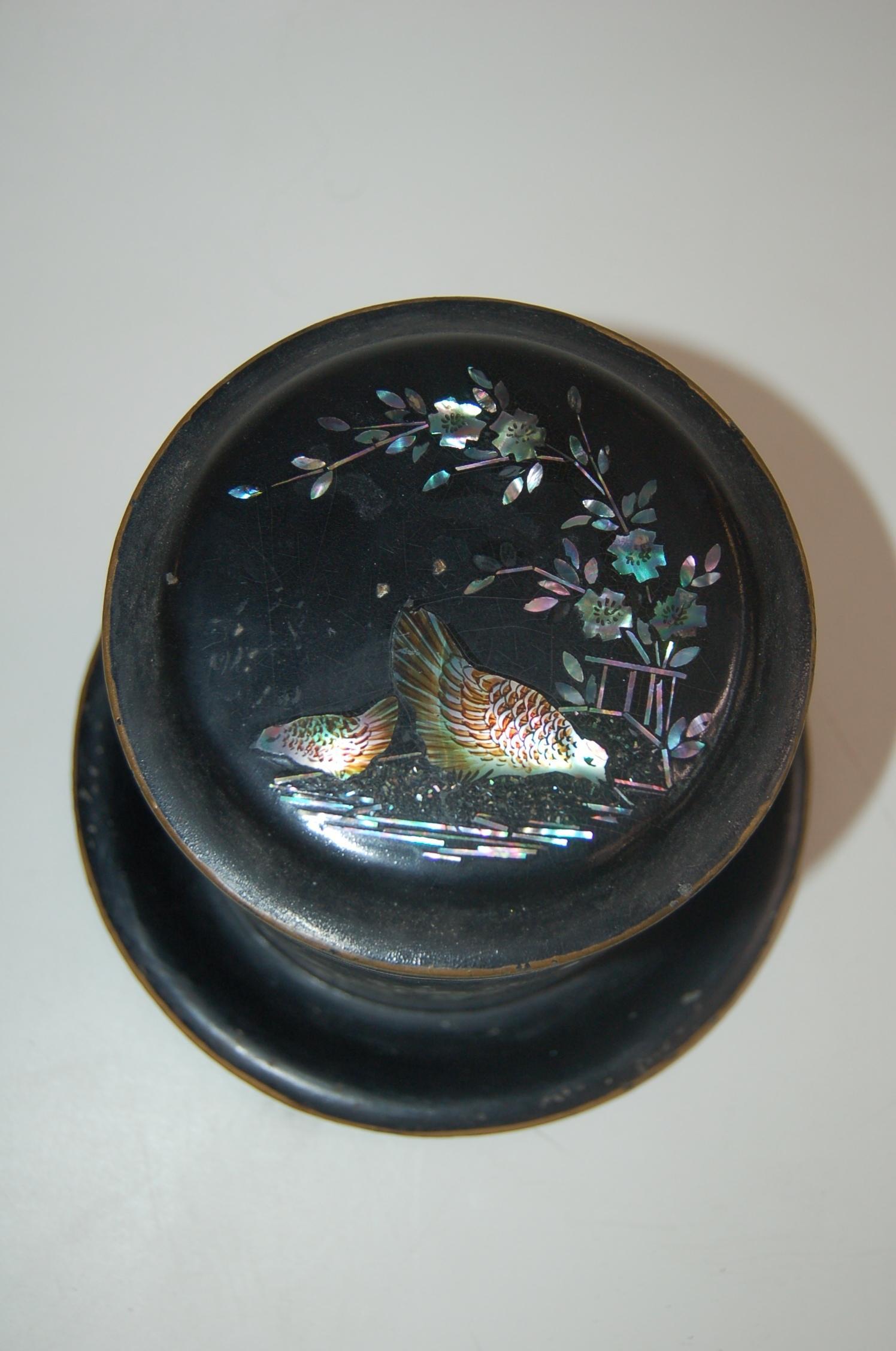Vintage Japanese black tin with Aboloni accents round tea caddie/canister hinged top and removable inner piece in chicken and floral motif. 

Measures 6