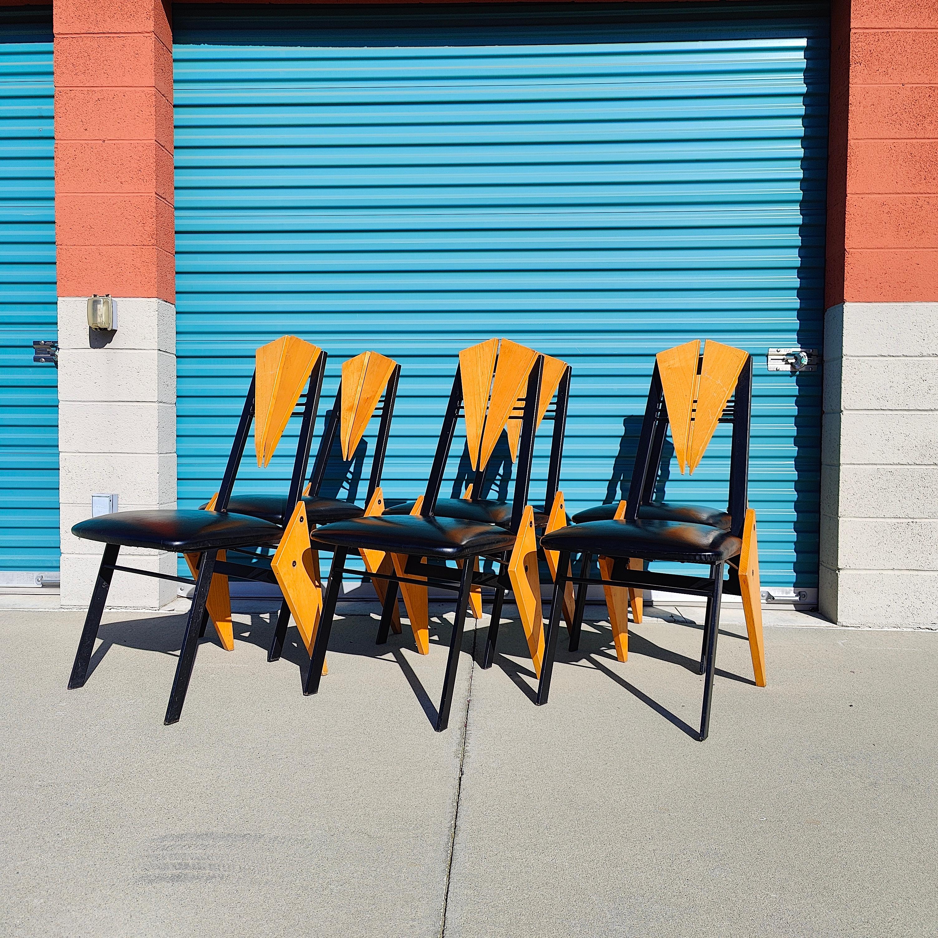 6 Abstract/Memphis chairs now available. They feature triangle wood back rest and legs that are geometrically pleasing to the eye. Frames are made out of metal with nice amount of patina for that vintage look. Funky look overall! Very fun