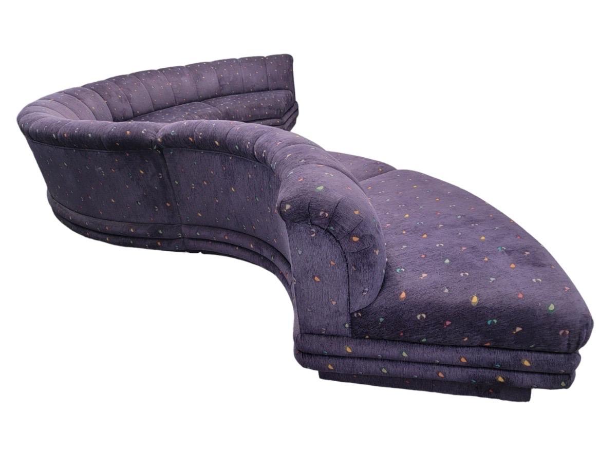Vintage Postmodern Channel Back Flared Serpentine Sectional Sofa Styled After Bernhardt Original Upholstery 

This Bernhardt serpentine sofa is in its original purple upholstery and can definitely be used as is or we can custom upholster it for you.