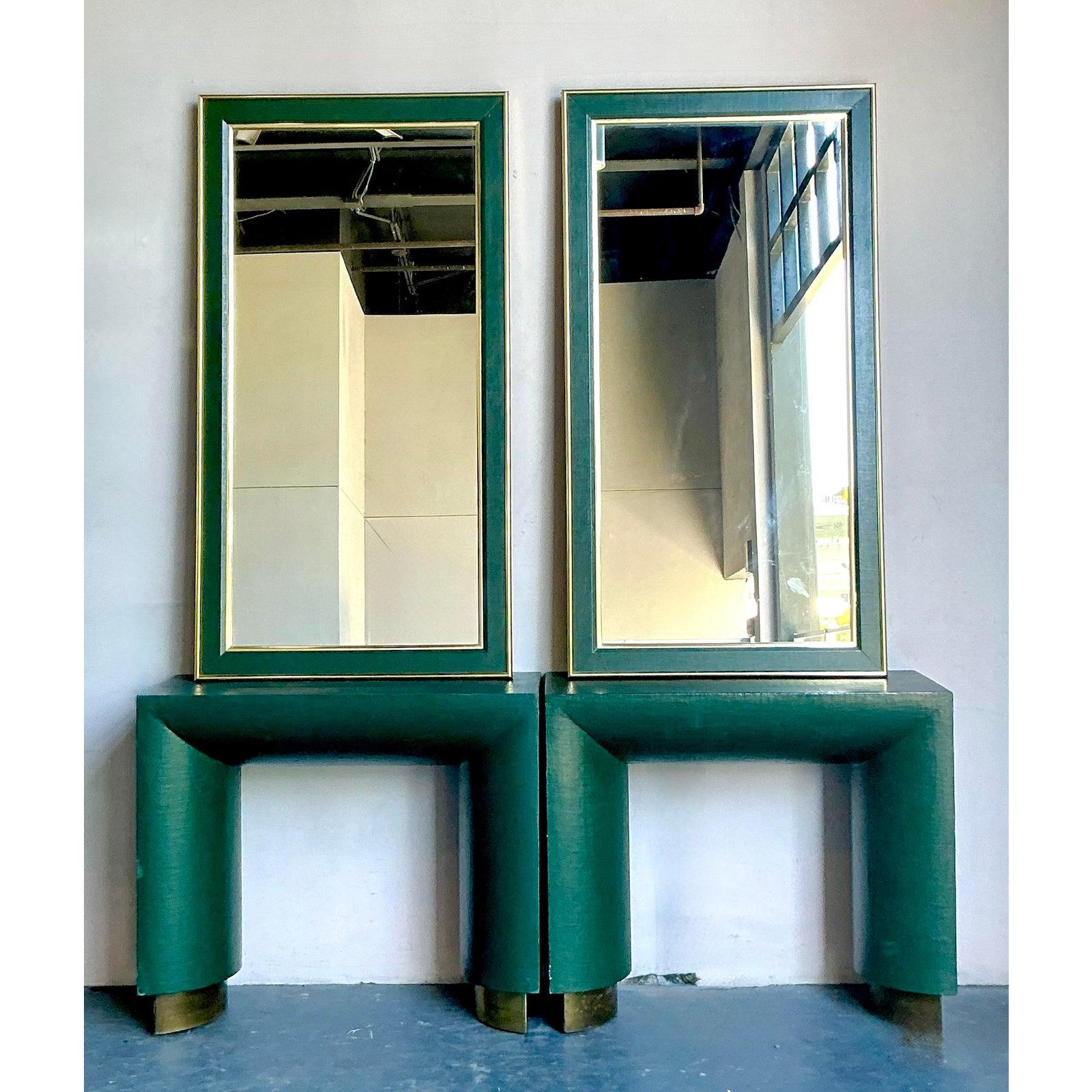 This striking pair of console tables embodies the bold geometry and textural richness of Postmodern design from the 1980s. Each table is expertly constructed in an arresting waterfall silhouette, featuring generously rounded legs and a clean, solid