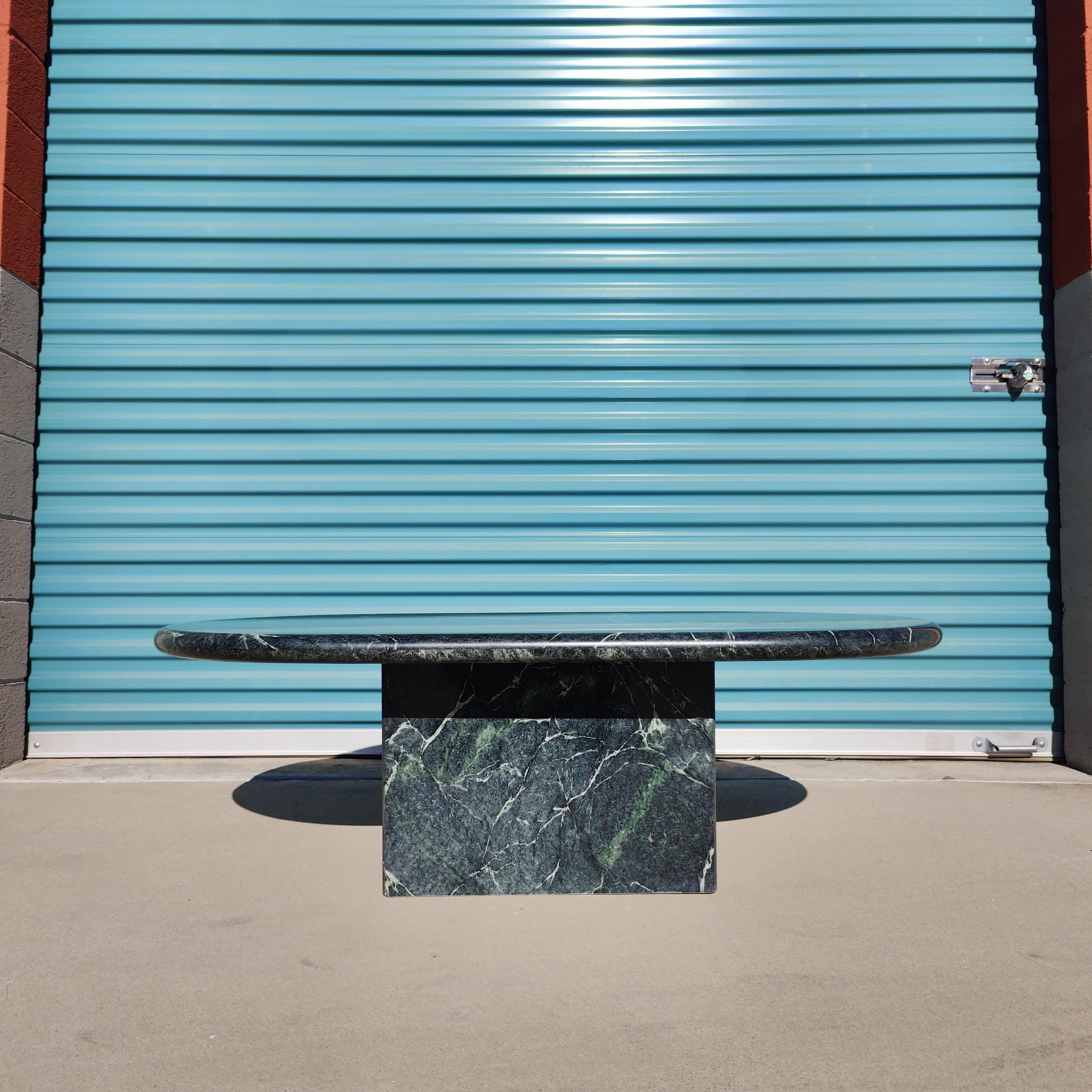 Green marble coffee table with amazing veins now available. Measures approximately 50.75 x 28.5 x 16. In excellent condition with no visible chips or cracks!

 