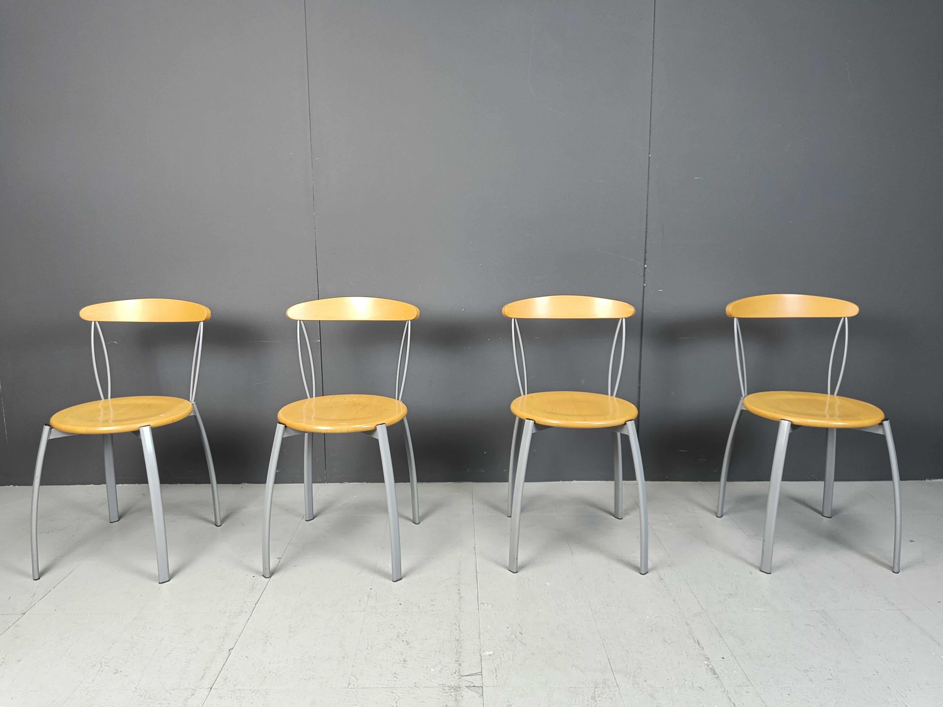Vintage plywood and grey metal dining chairs made in Italy in the 1990s.

Beautiful timeless and elegant design.

1990s- Italy

Very good condition

Dimensions:
Height: 78cm
Width: 40cm
Depth: 40cm
Seat height: 46cm

Ref.: 24111201

*price is for