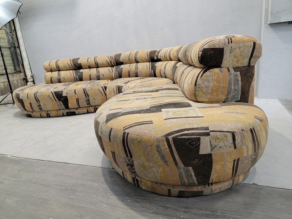 Vintage Postmodern Kagan Style Curved Three Piece Sectional Sofa

This vintage postmodern Kagan style sectional sofa is in its original fabric. Its three sections allow you to arrange the pieces to best fit to your living or commercial space. It’s