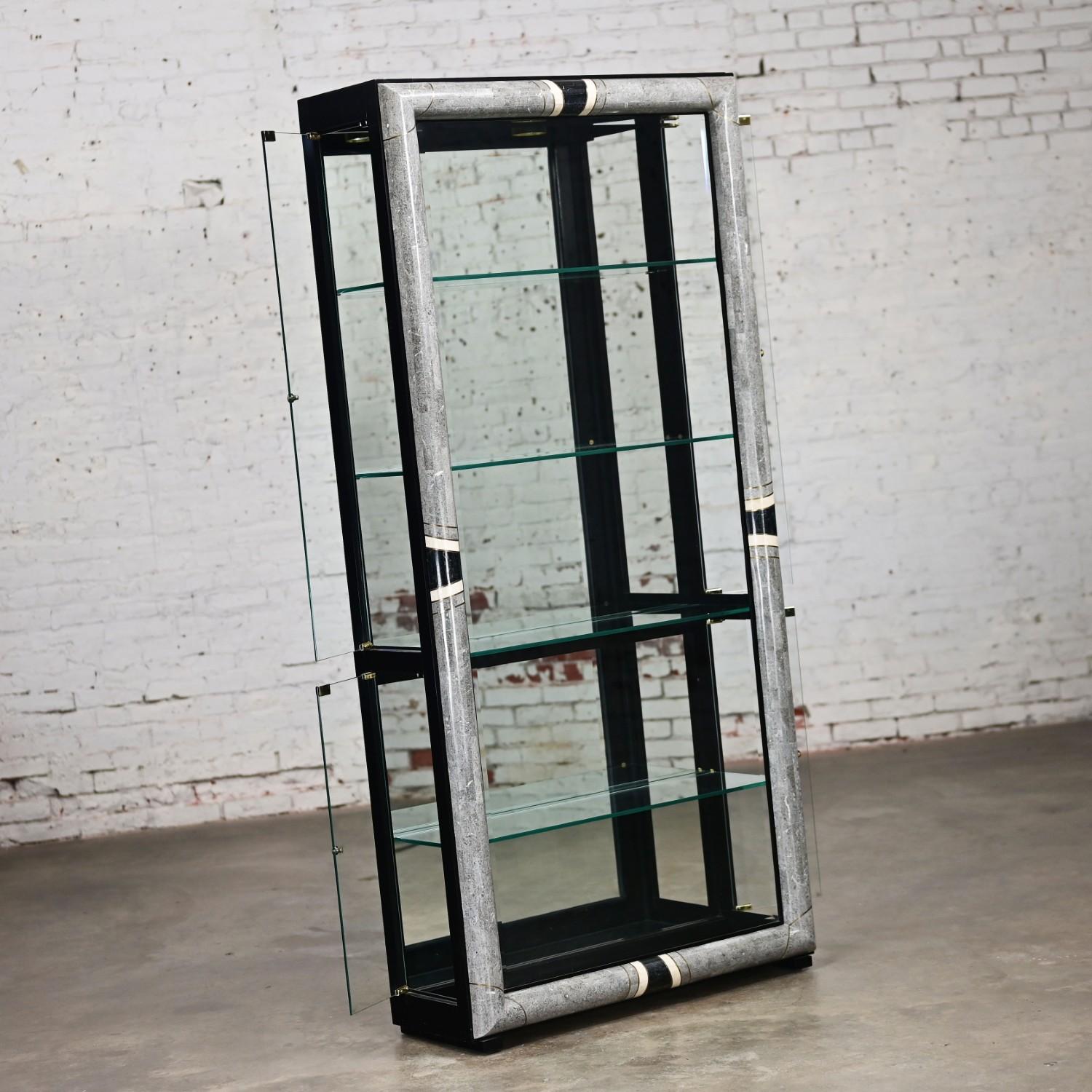 Handsome vintage Art Deco Revival to Postmodern wood, marble, brass, mirror, & glass lighted display case by Pulaksi Furnishings. Beautiful condition, keeping in mind that this is vintage and not new so will have signs of use and wear even if it has