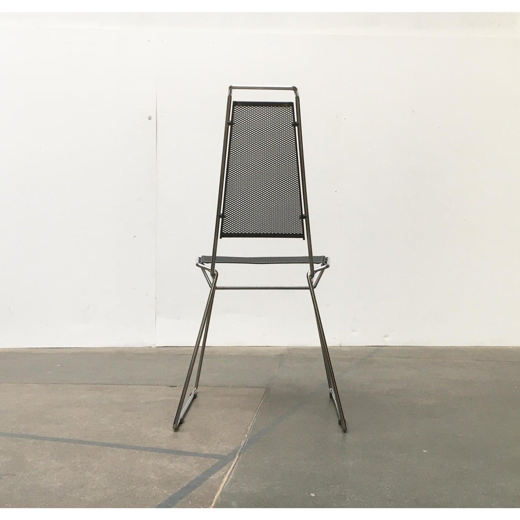 Postmodern metal chair based on a design by Rolf Rahmlow from the 80s.The frame of the chair is made … Read more Postmodern metal chair based on a design by Rolf Rahmlow from the 80s.The frame of the chair is made of round bars, which are precisely