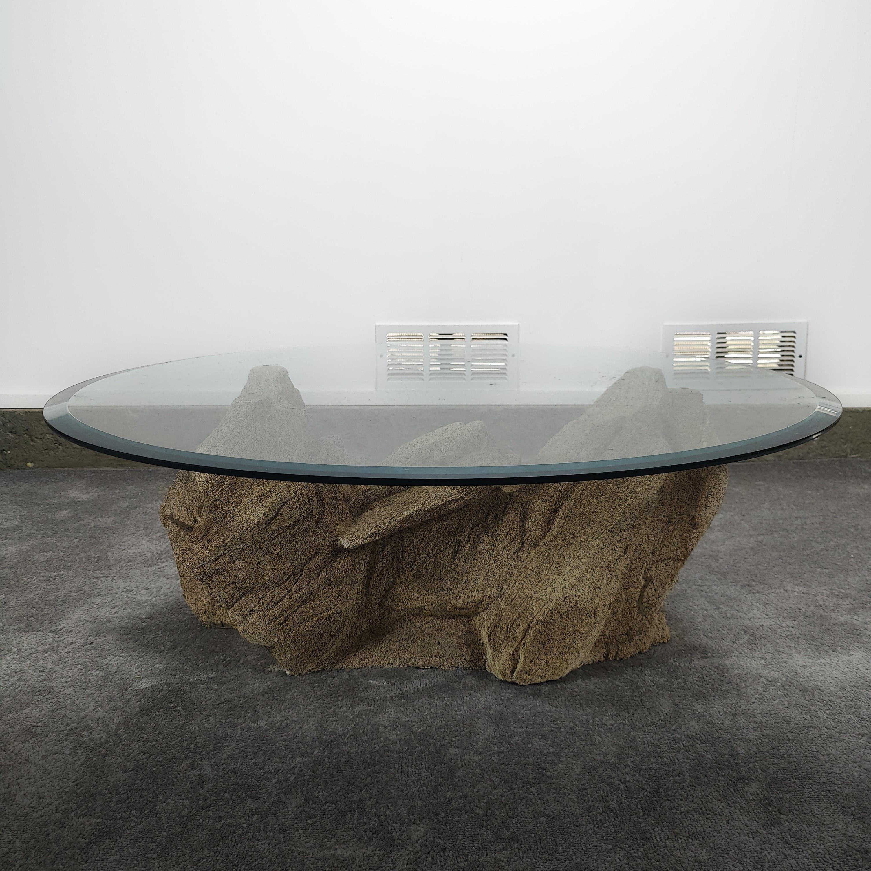 Sirmos ‘Quarry’ coffee table made out of speckled plaster, c1970s. 42” diameter x 15.25h. Perfect for the postmodern/neutral tones that we're seeing more and more of everyday. One chip on the edge of the glass, please refer to picture. Some chipping