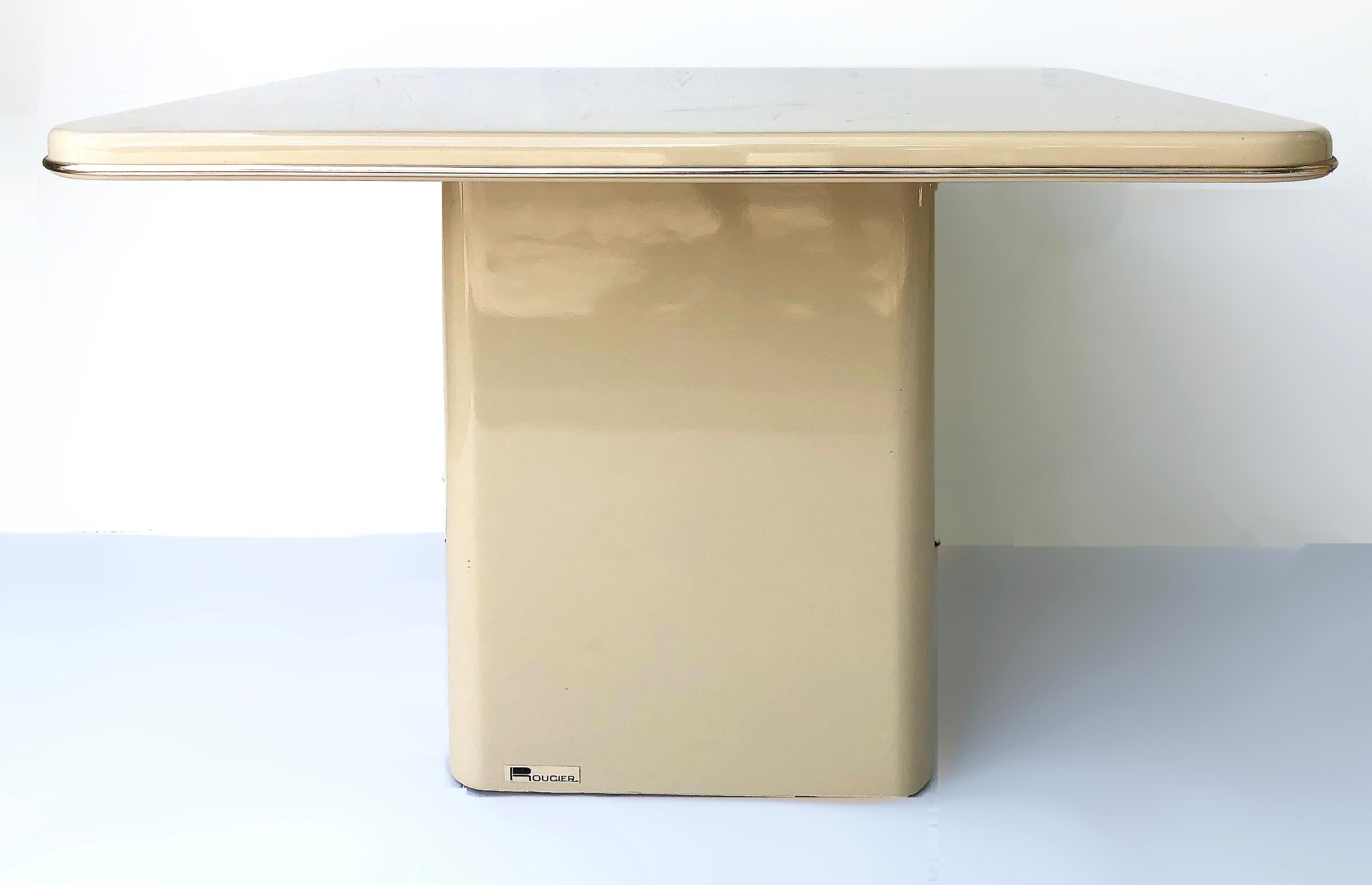 Vintage postmodern rougier sculptural side tables, 1980s


Offered for sale is a pair of vintage 1980s Postmodern Rougier side tables created in a sculptural form. The tables are laminate and have brass-tone trim surrounding them. The tops are