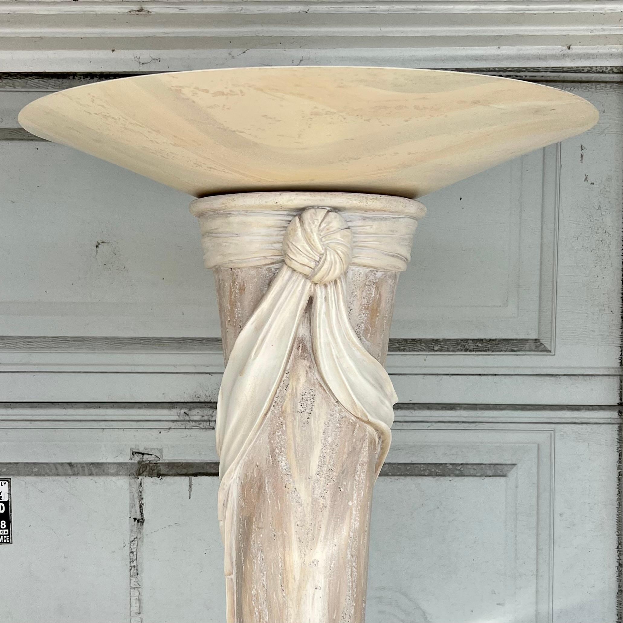 Exquisite sculptural plaster lamp tied with a “ribbon.” Faux travertine plaster and fine detailing. Excellent condition.  There is one tiny chip (see photo.) The floor lamp will come with an external on/off switch for to the outlet plug as no switch