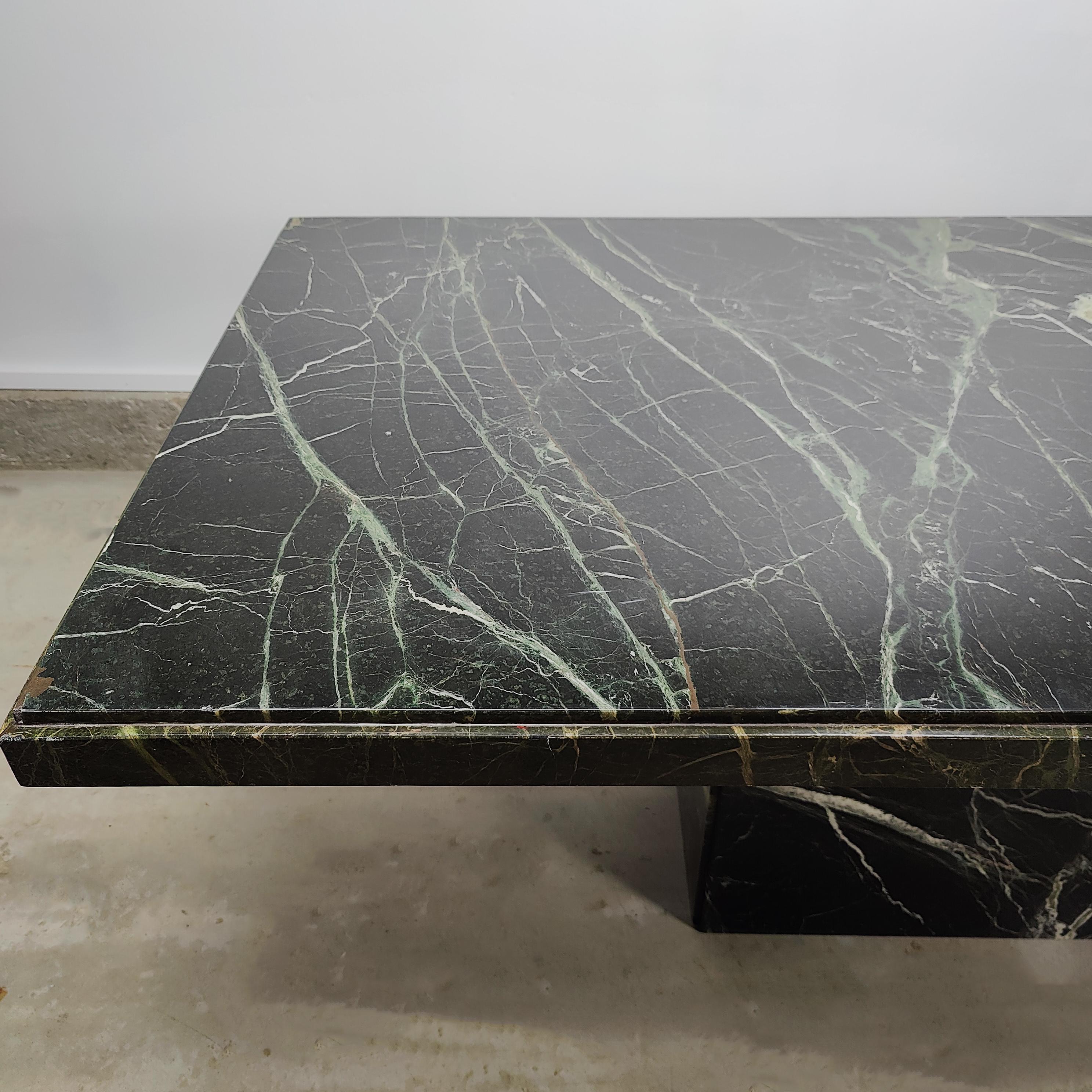 Solid marble dining table with green, burgundy, and black tones and amazing veining throughout. Measures approximately 71 x 35.5 x 29.5t. Small amount of chipping on top, please refer to pictures! Base and top removable.

 
