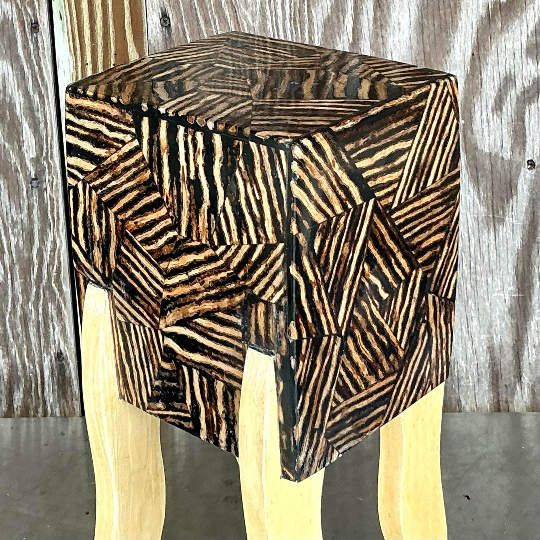 Add a striking and functional element to your space with this Vintage Postmodern Tabletop Set of Drawers. Featuring a bold geometric design, this set of drawers combines sleek lines with eclectic postmodern flair. The drawers' contrasting colors and
