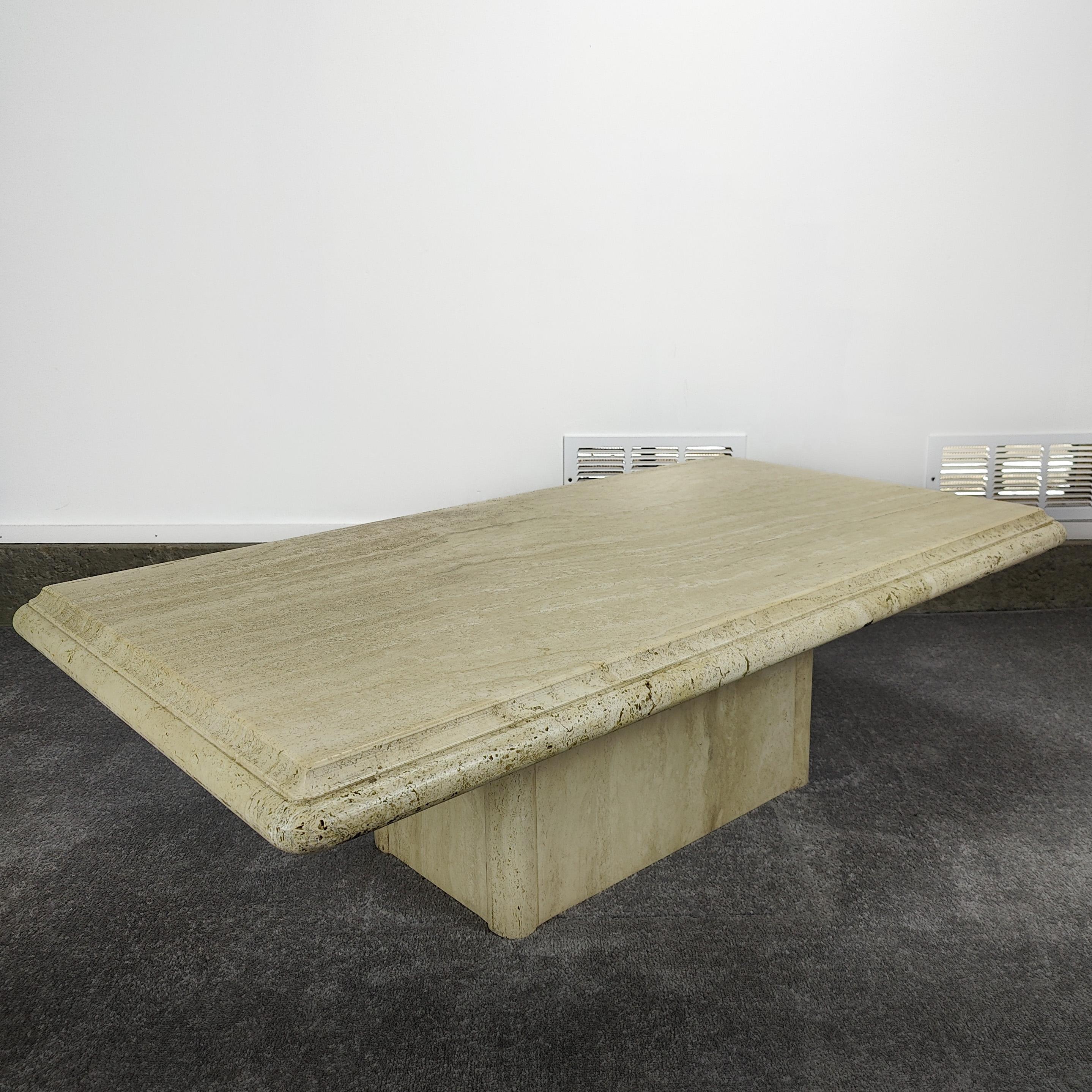 Postmodern 80s Travertine coffee table. Lovely neutral tone with a porous finish. Excellent condition. 50.5w x 28w x 16h. Perfect for that nuetral tones and minimalistic style that were currently experiencing.

If you have any questions, please