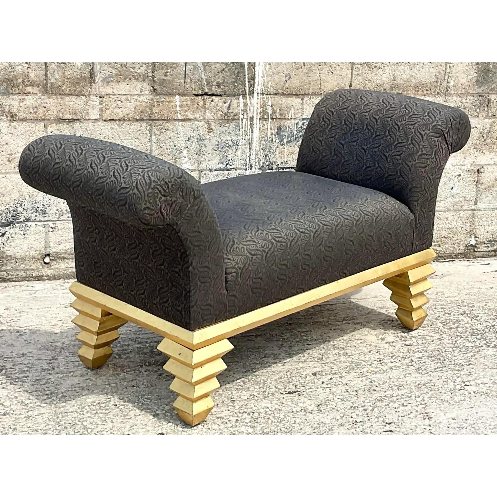 Fantastic vintage Postmodern bench. High scroll arms in a black paisley jacquard. Carved zig zag wood base with a bright gold finish. Super glamorous. Acquired from a Palm Beach estate.