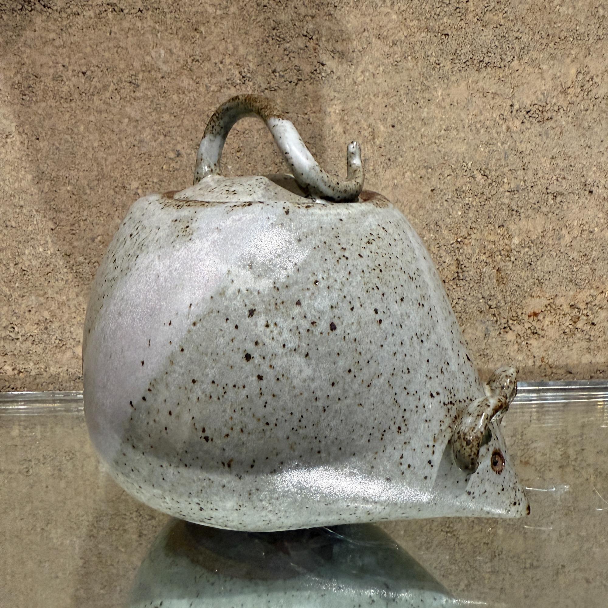 For your consideration, a vintage pottery cookie jar / safekeeping in mice or mouse shape. One of a kind, not mass produced. Great quality. Unmarked. 

Dimensions: 7.5